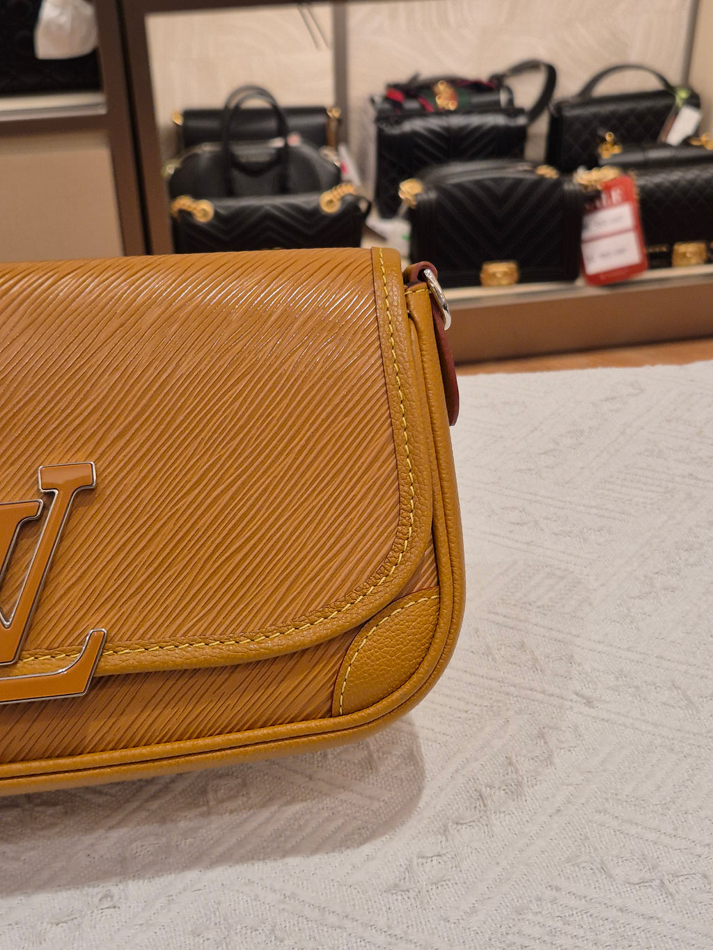 Louis Vuitton Buci Epi Gold