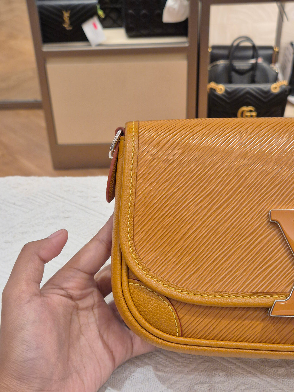 Louis Vuitton Buci Epi Gold