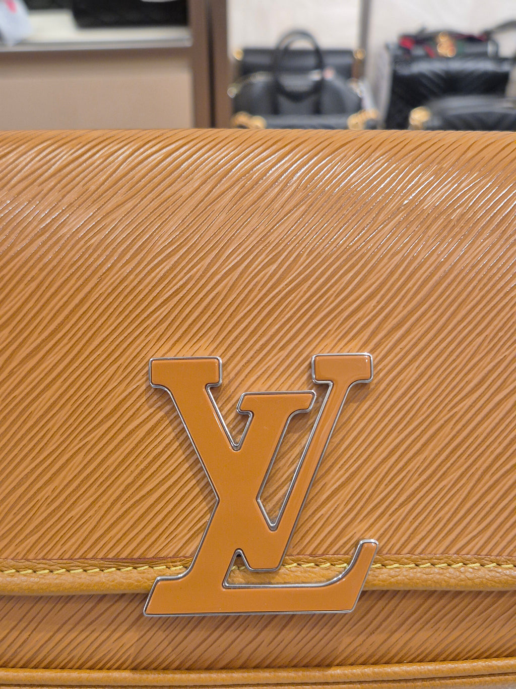 Louis Vuitton Buci Epi Gold