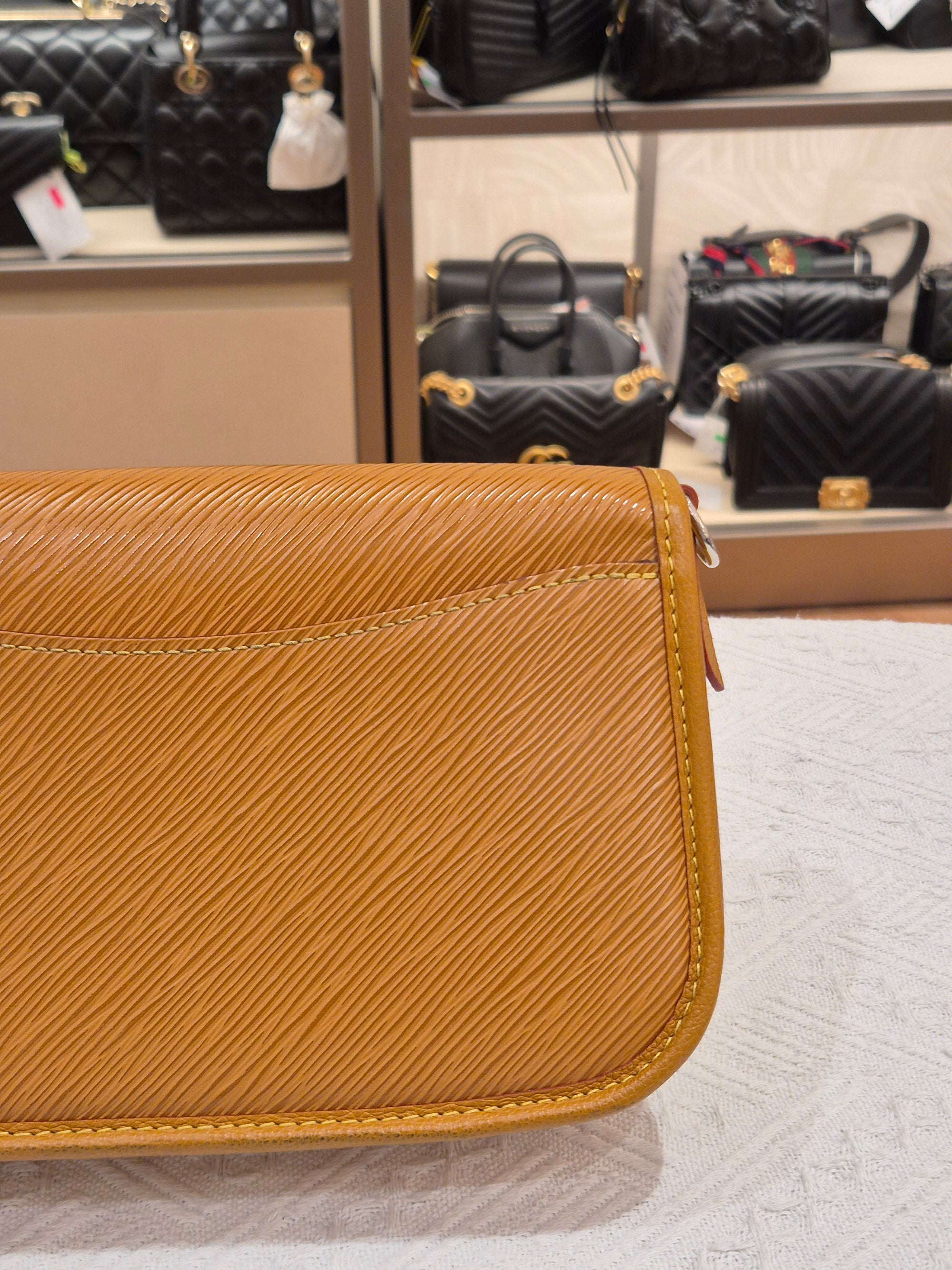 Louis Vuitton Buci Epi Gold
