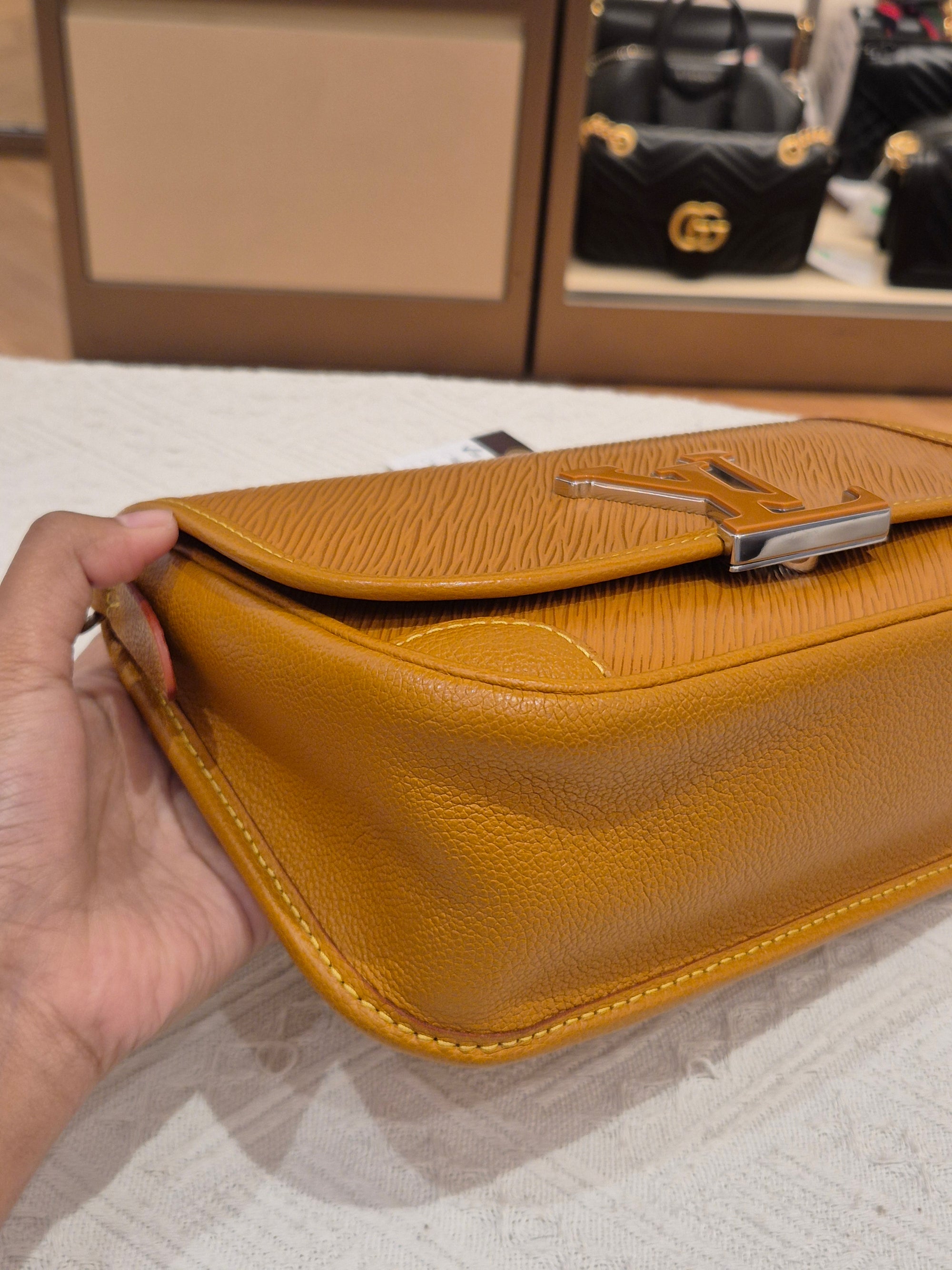 Louis Vuitton Buci Epi Gold