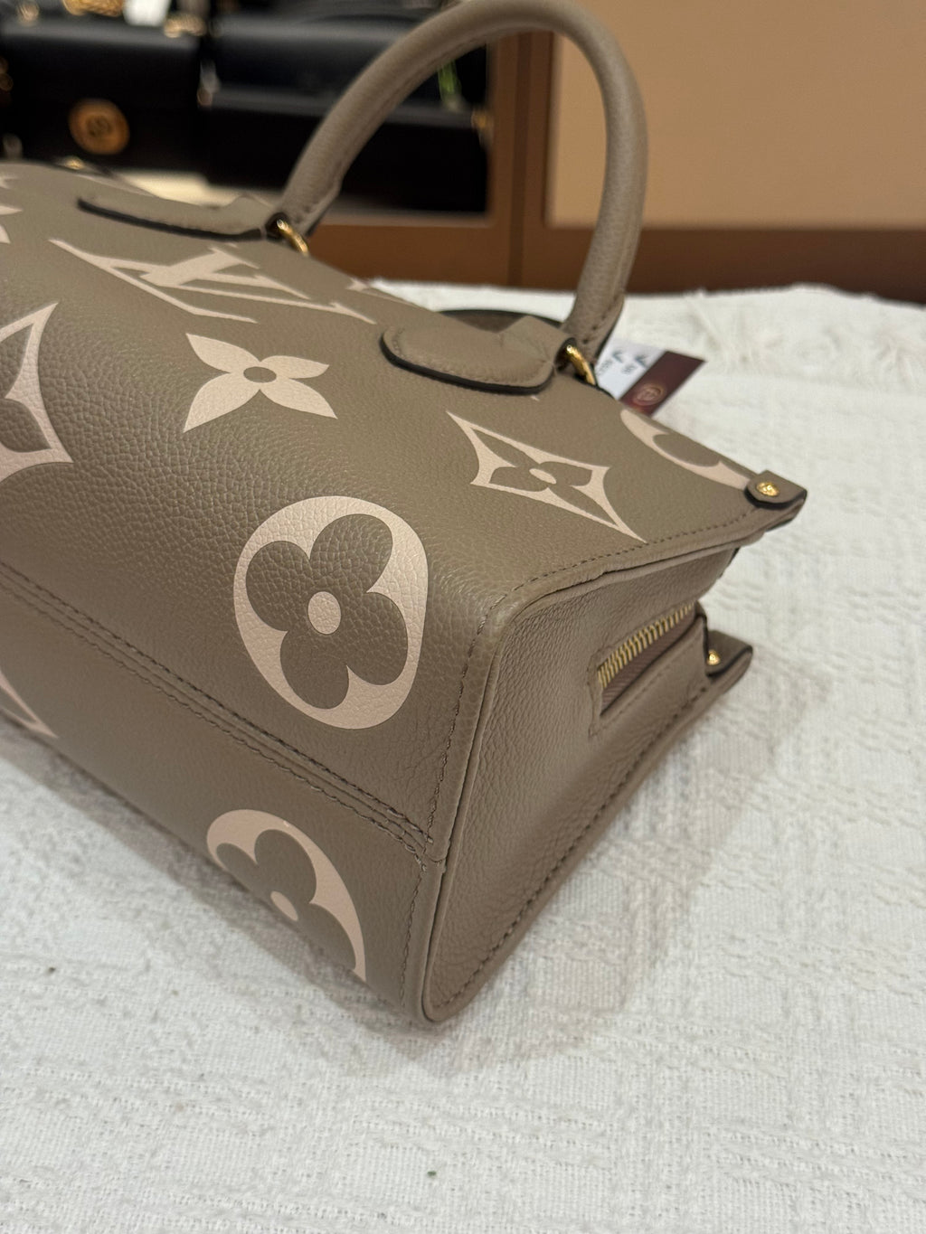 Louis Vuitton On The Go East West Bicolor Monogram Empriante
