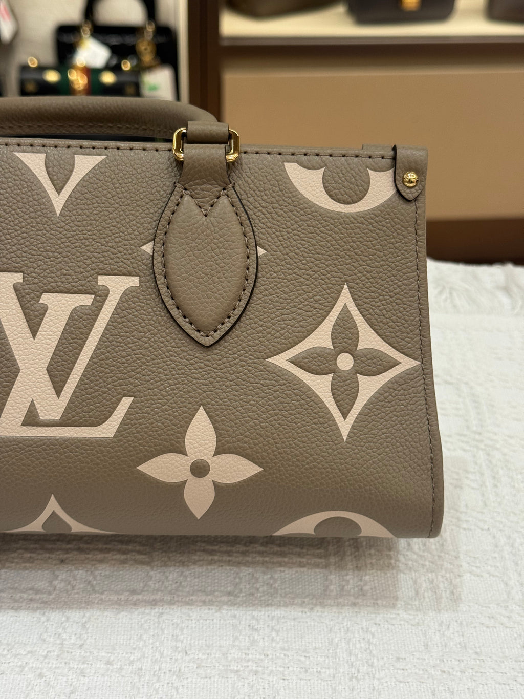 Louis Vuitton On The Go East West Bicolor Monogram Empriante