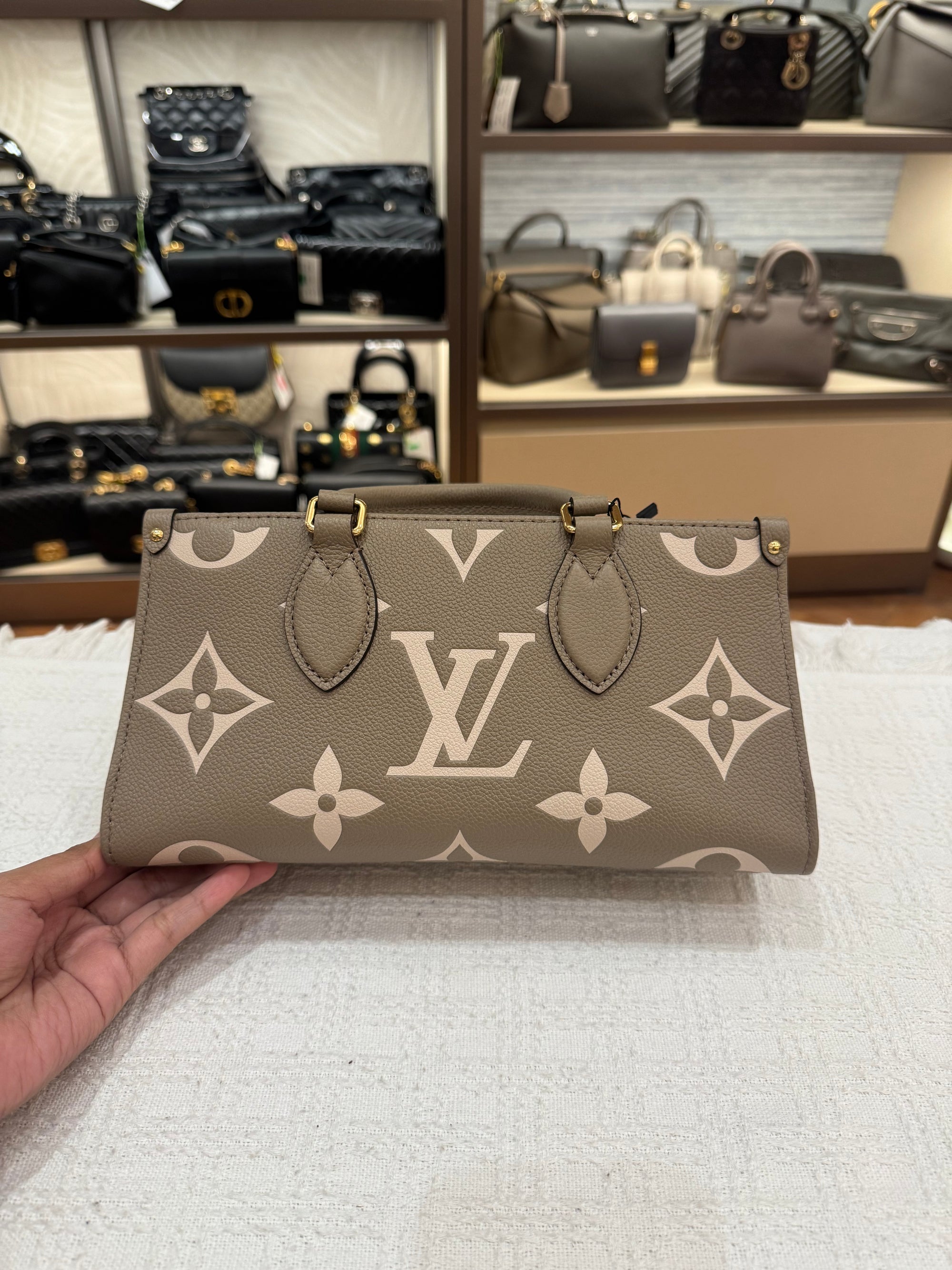 Louis Vuitton On The Go East West Bicolor Monogram Empriante