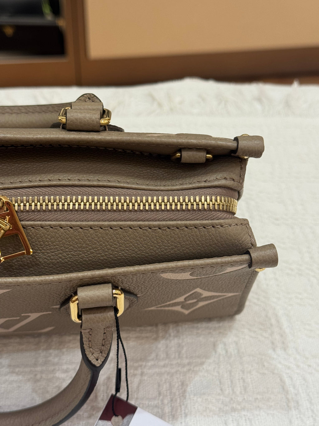 Louis Vuitton On The Go East West Bicolor Monogram Empriante