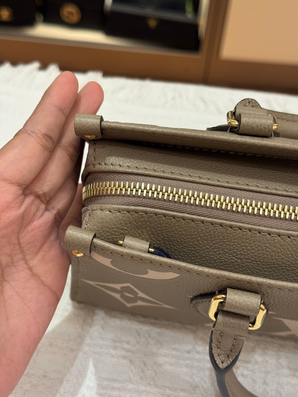 Louis Vuitton On The Go East West Bicolor Monogram Empriante