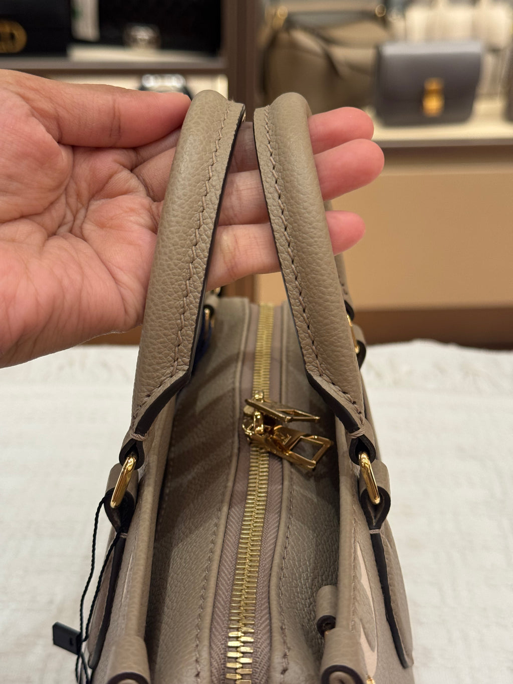 Louis Vuitton On The Go East West Bicolor Monogram Empriante