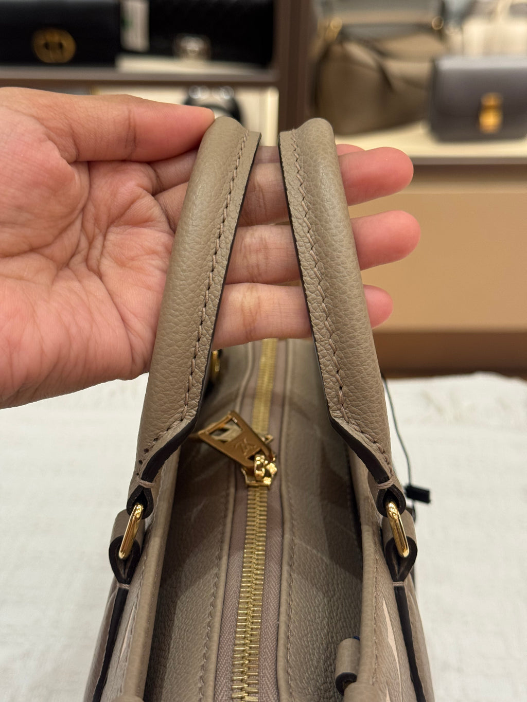 Louis Vuitton On The Go East West Bicolor Monogram Empriante
