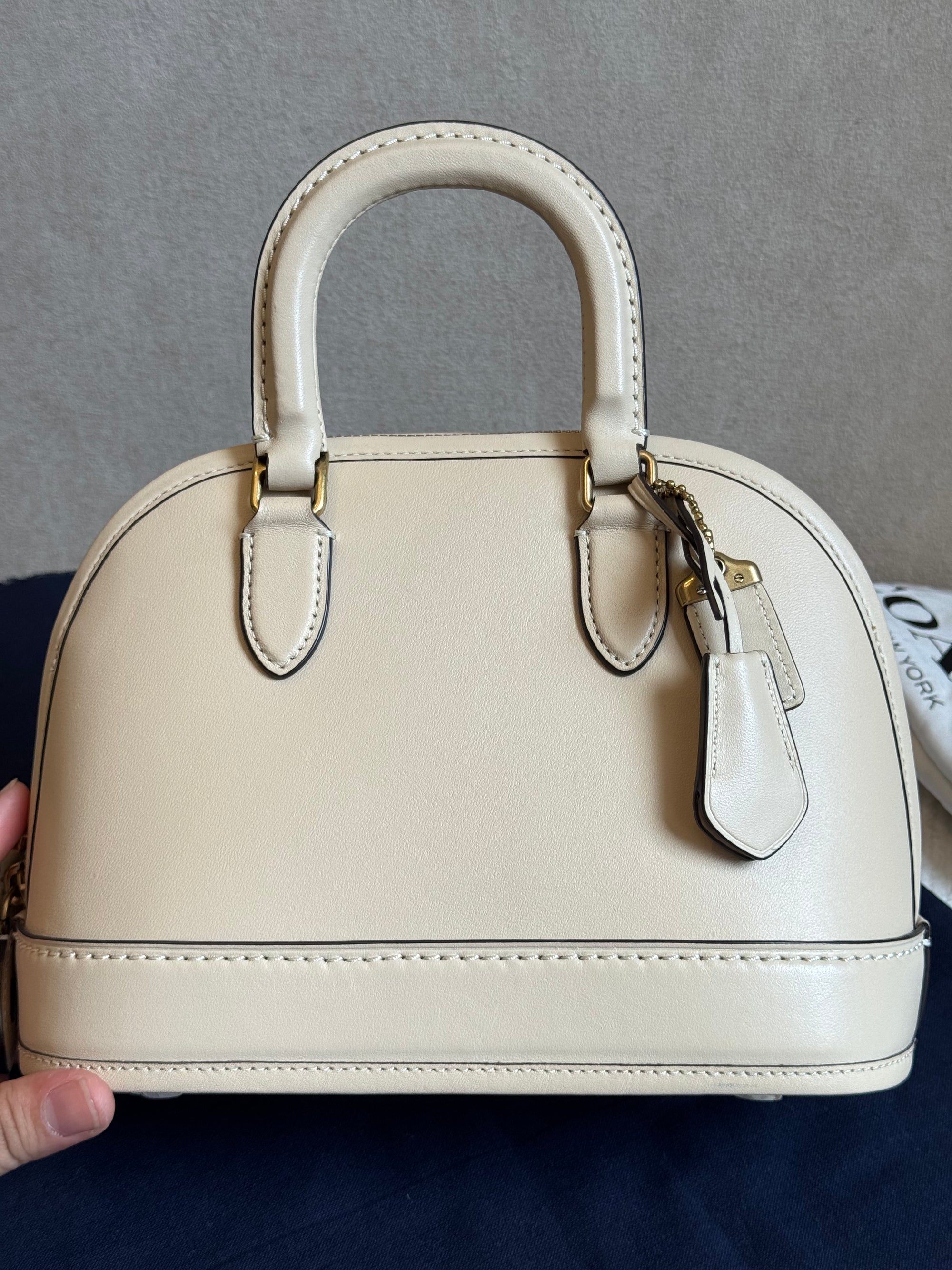 Coach Reveal Alma