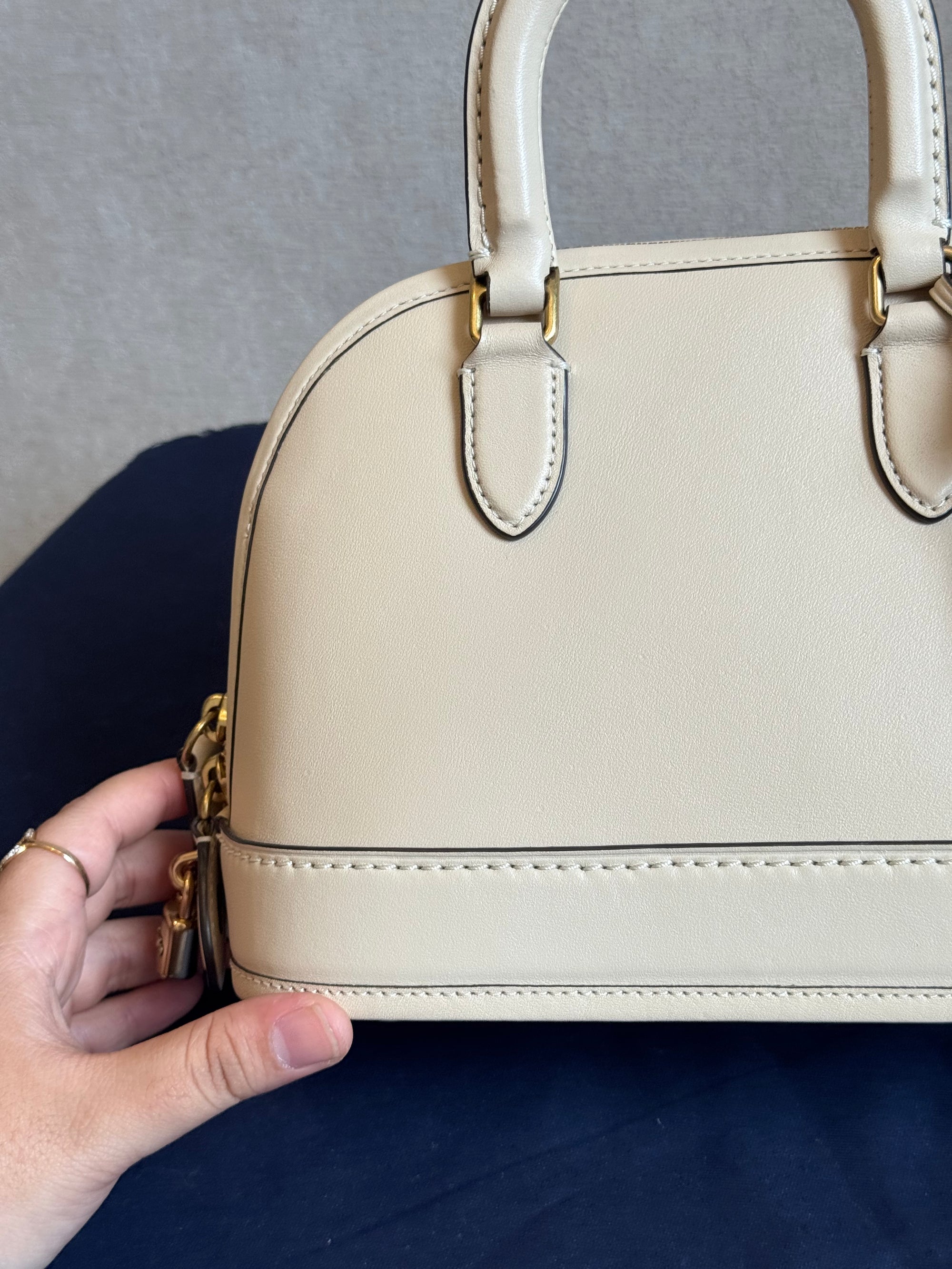Coach Reveal Alma
