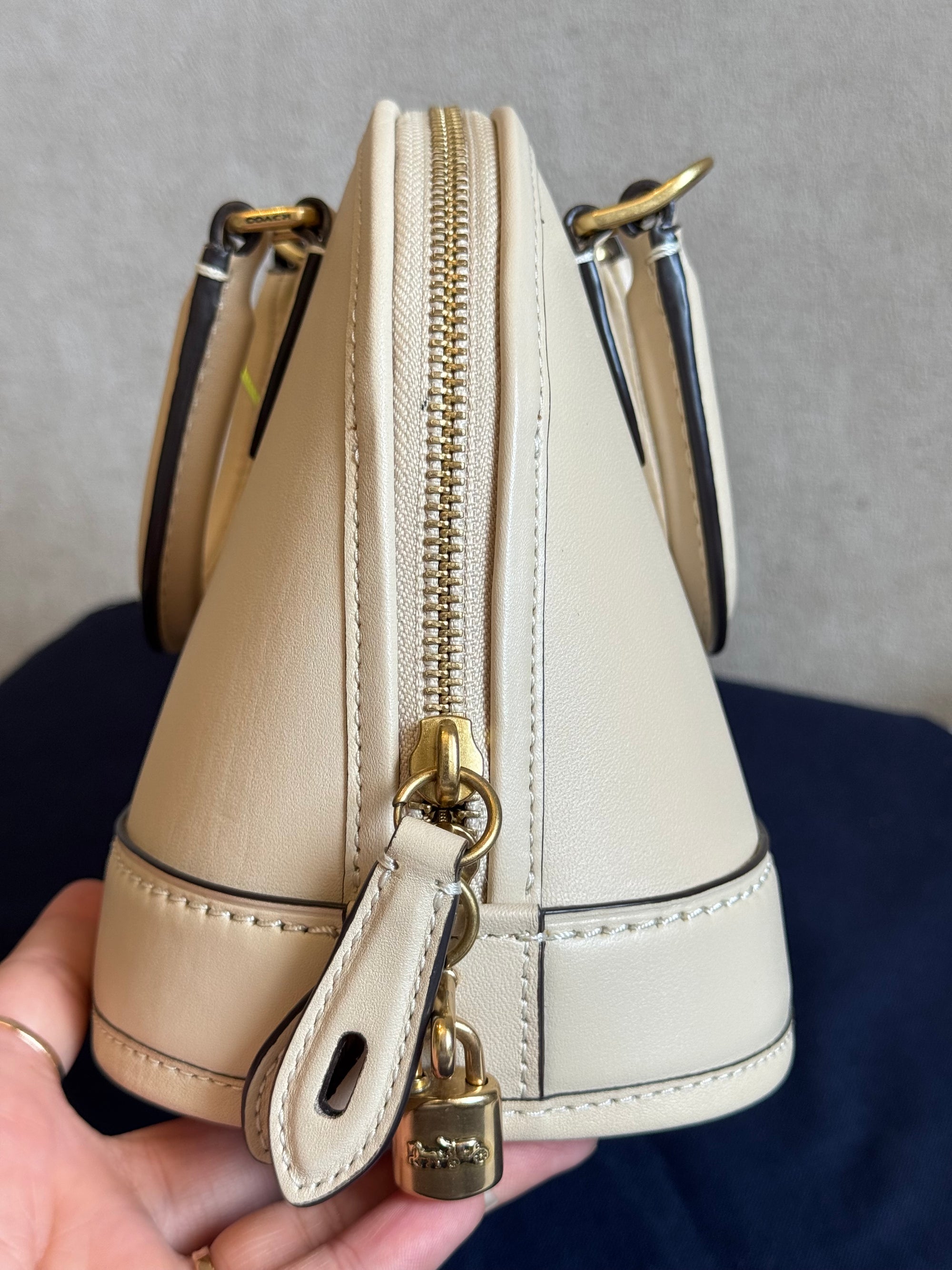 Coach Reveal Alma