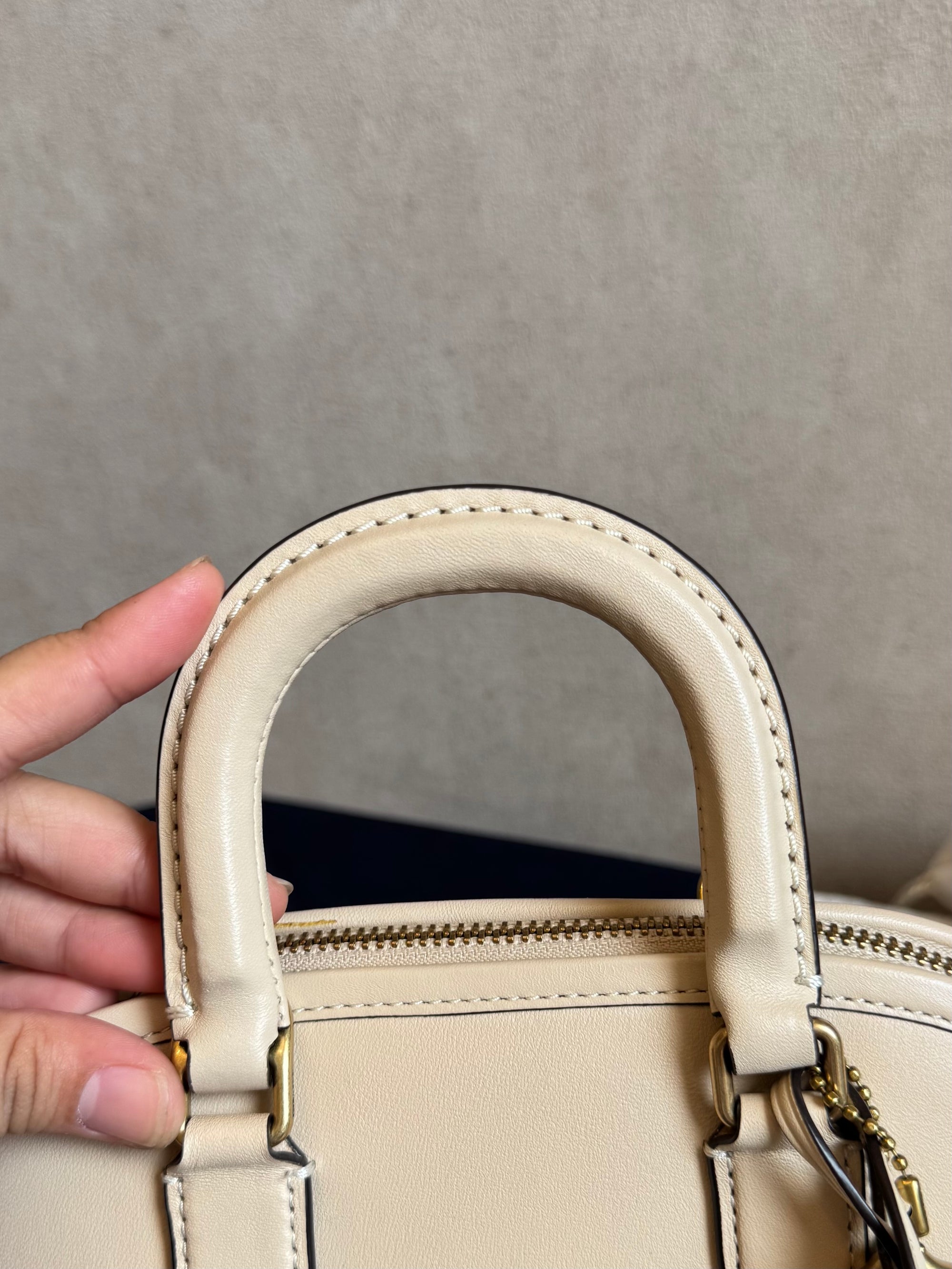 Coach Reveal Alma