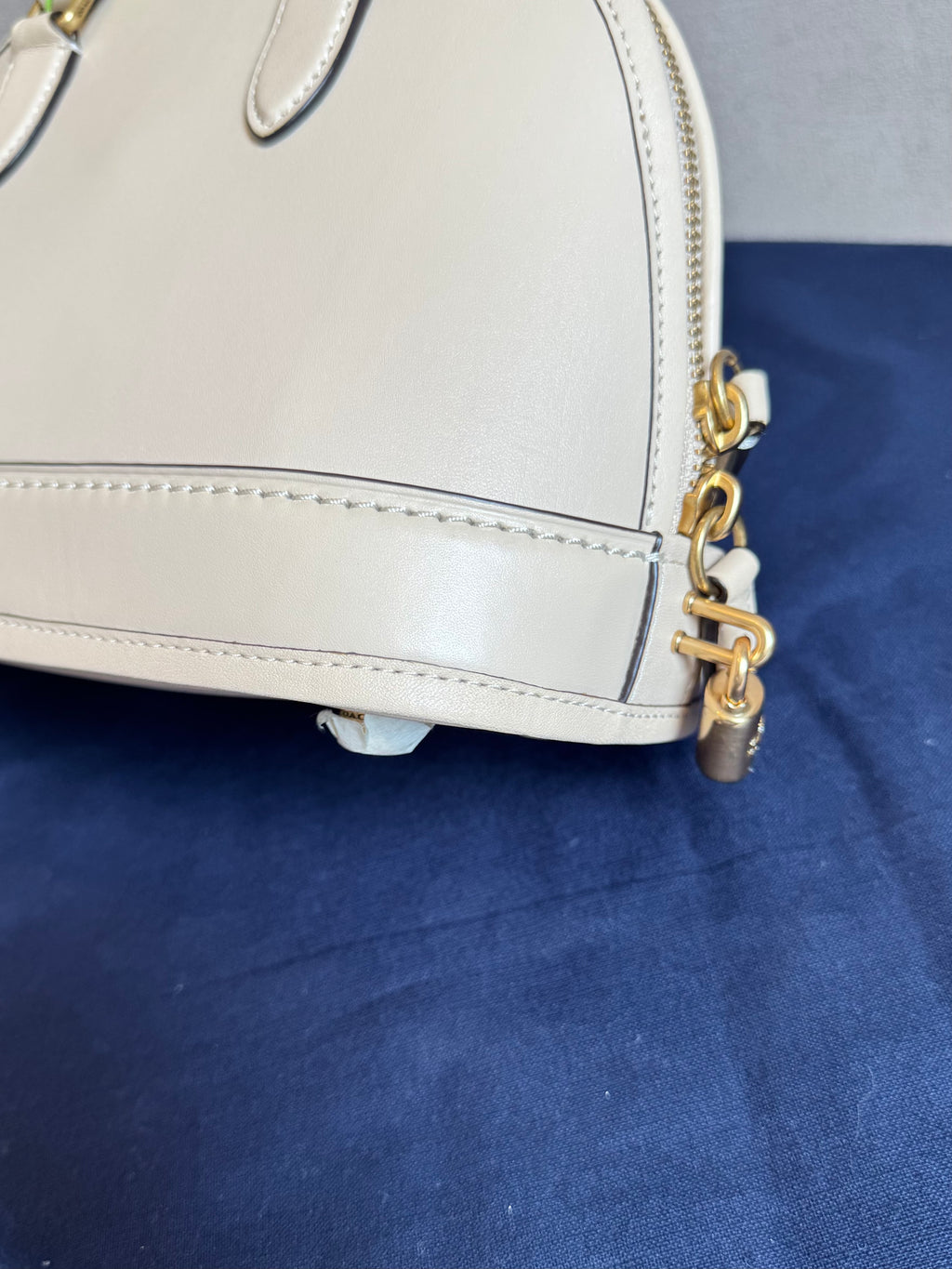 Coach Reveal Alma