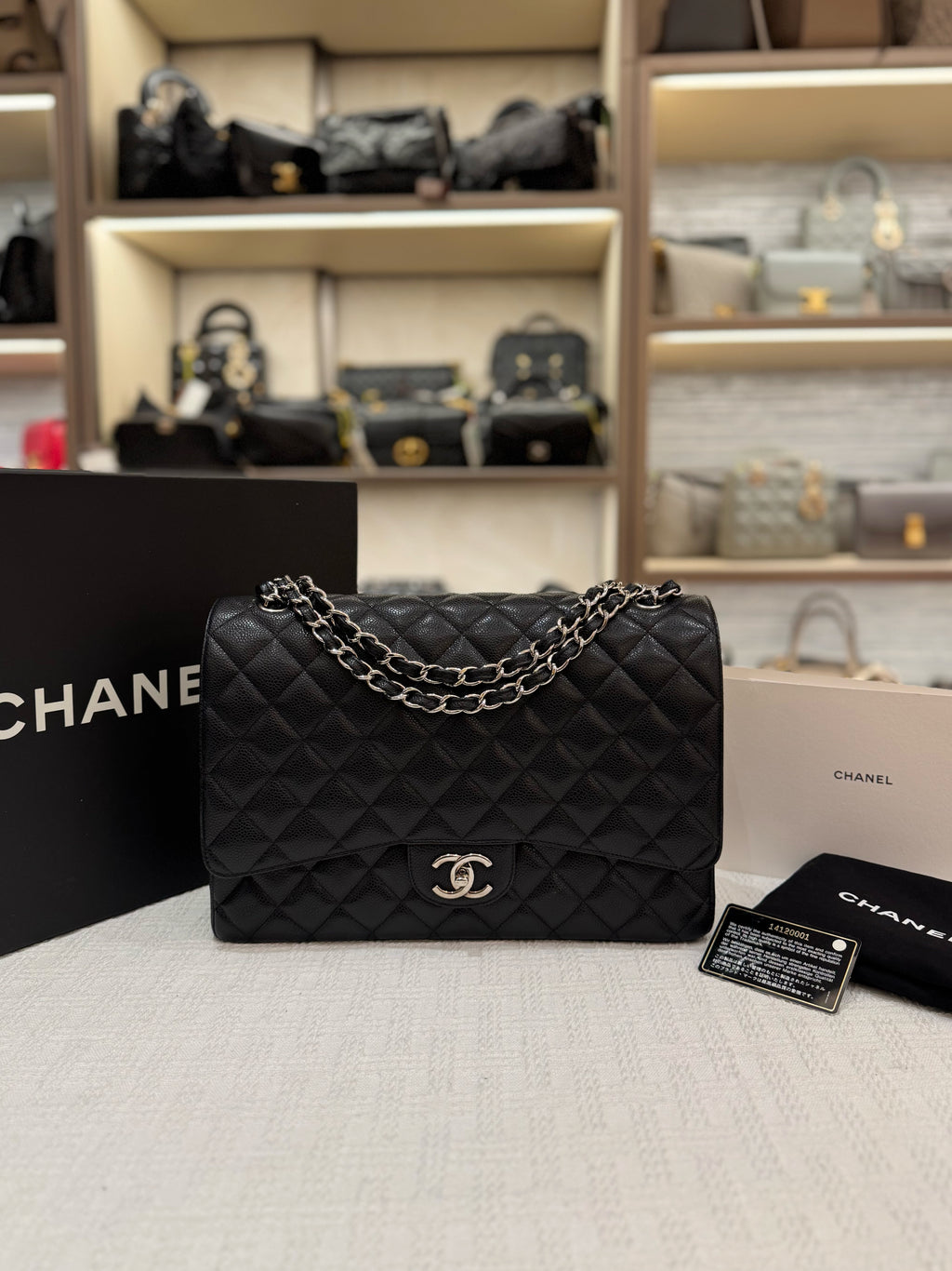 Chanel Maxi Classic Double Flap Black Caviar