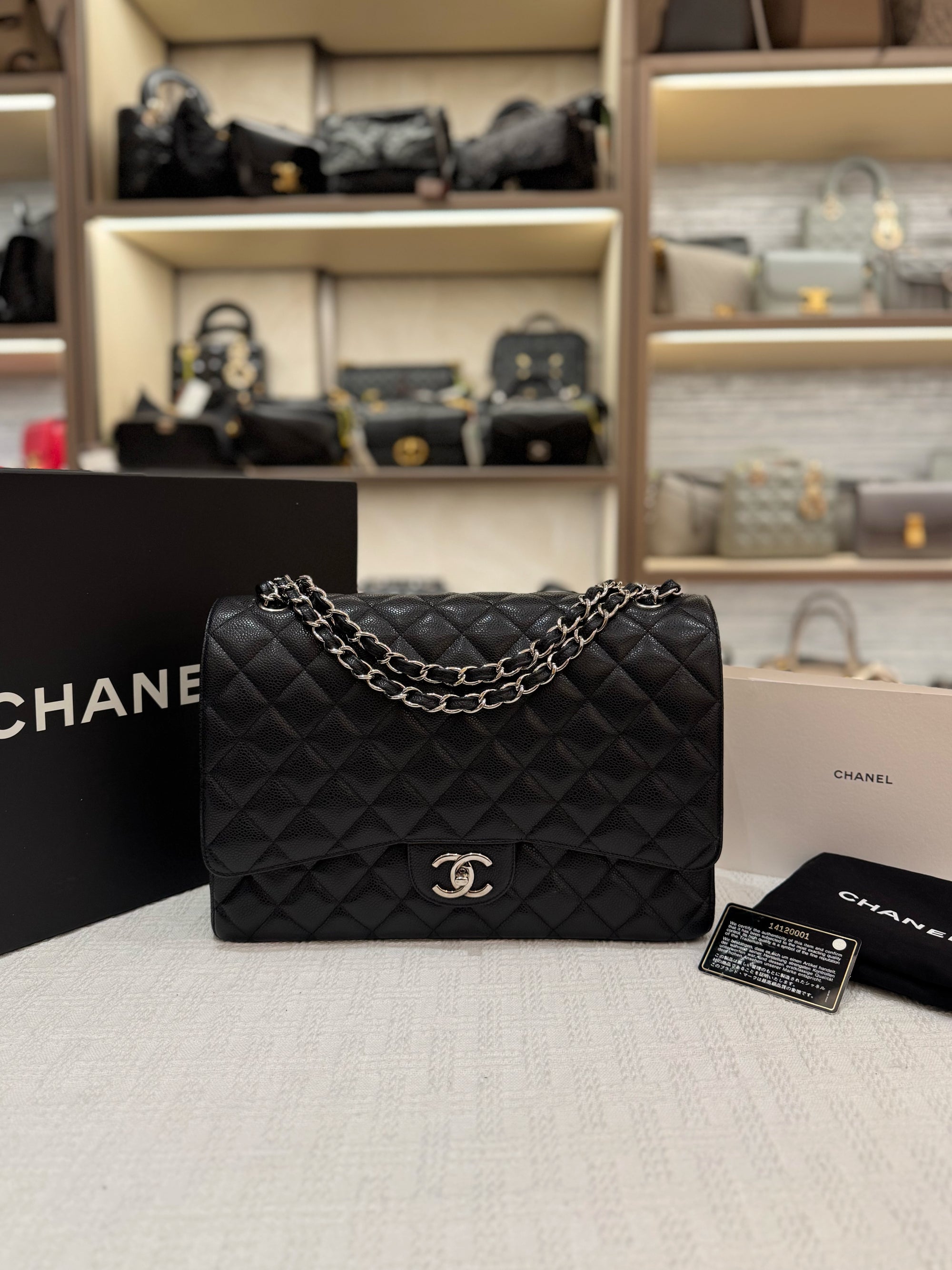 Chanel Maxi Classic Double Flap Black Caviar