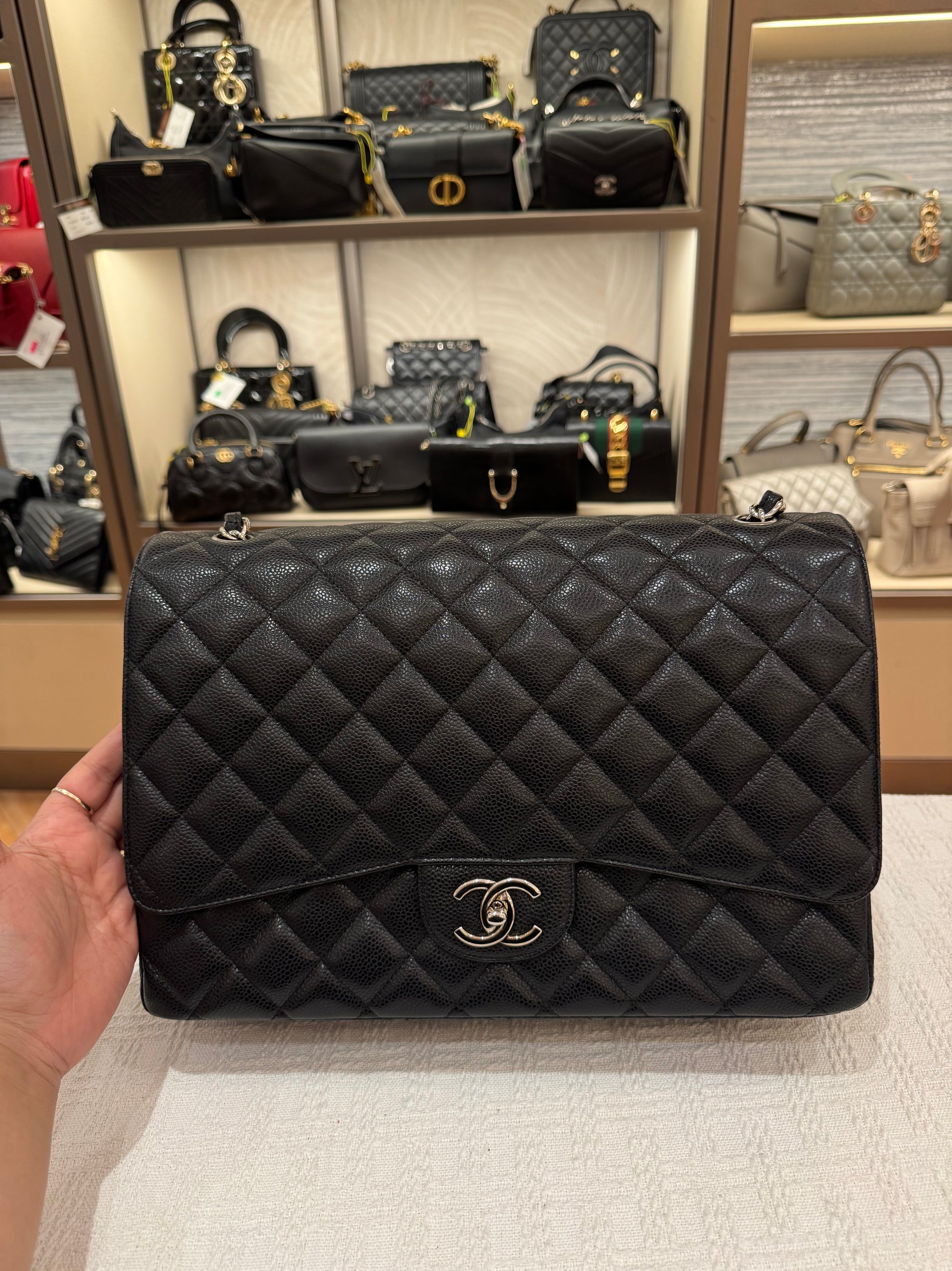Chanel Maxi Classic Double Flap Black Caviar