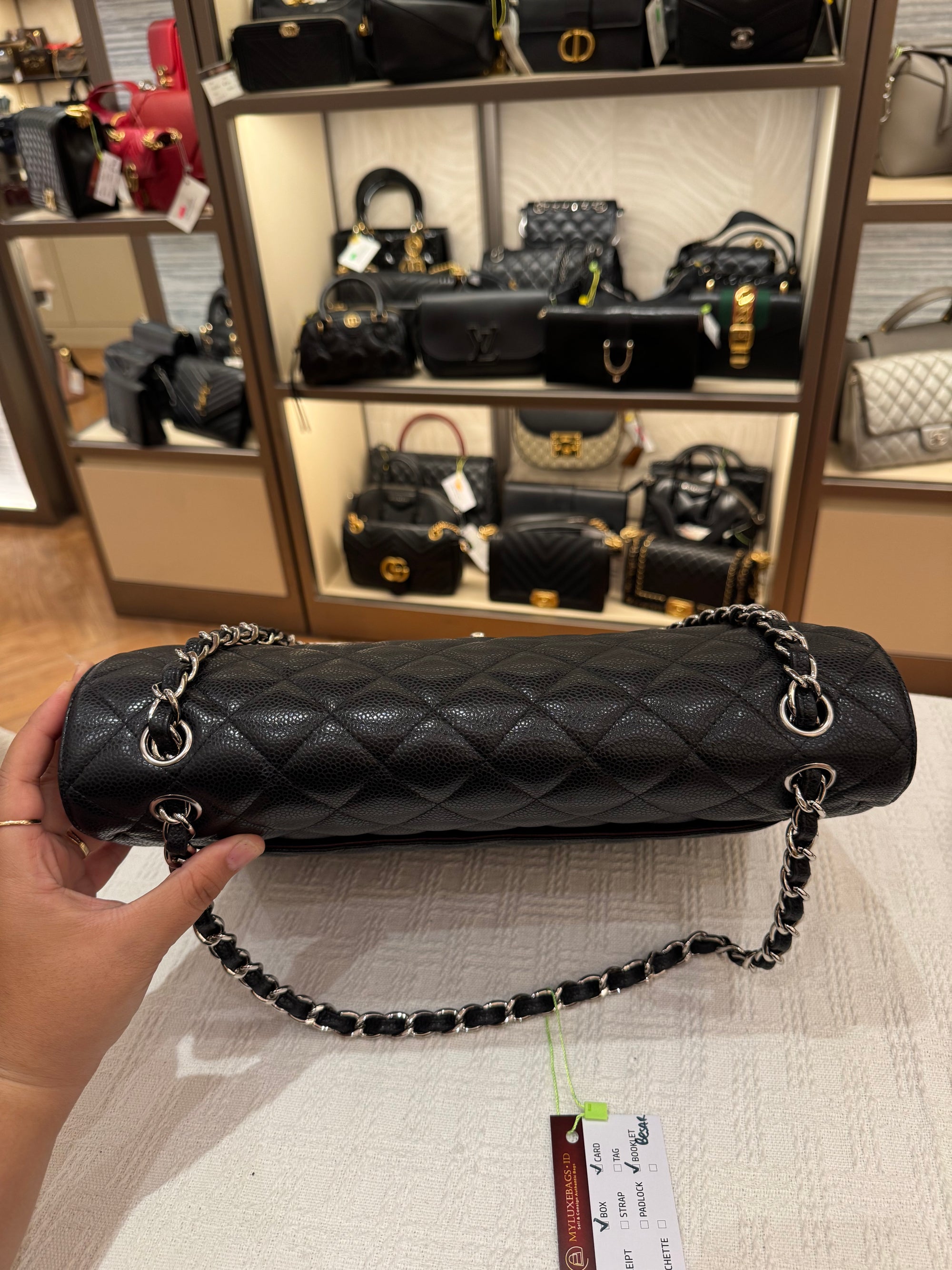 Chanel Maxi Classic Double Flap Black Caviar