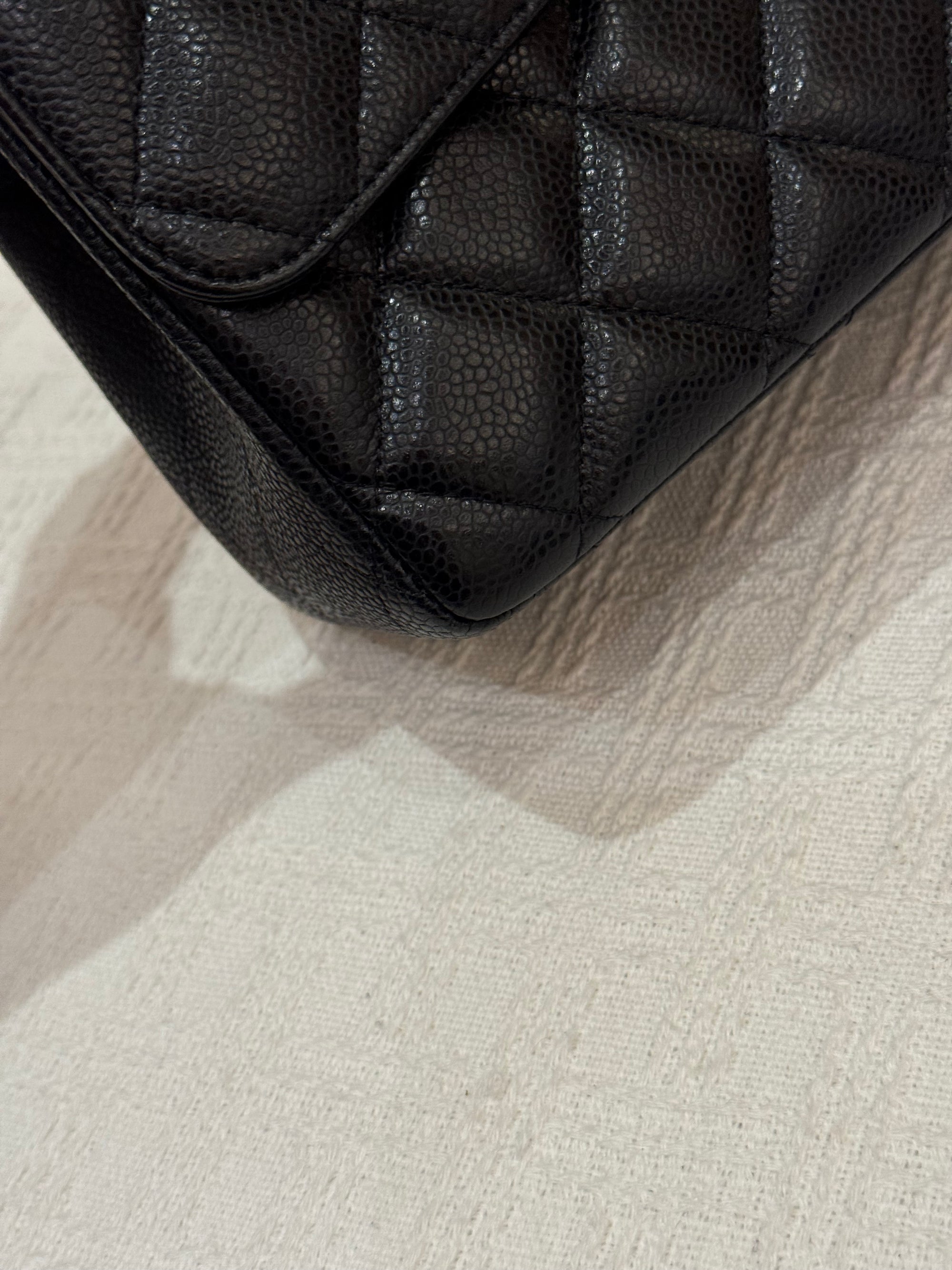 Chanel Maxi Classic Double Flap Black Caviar
