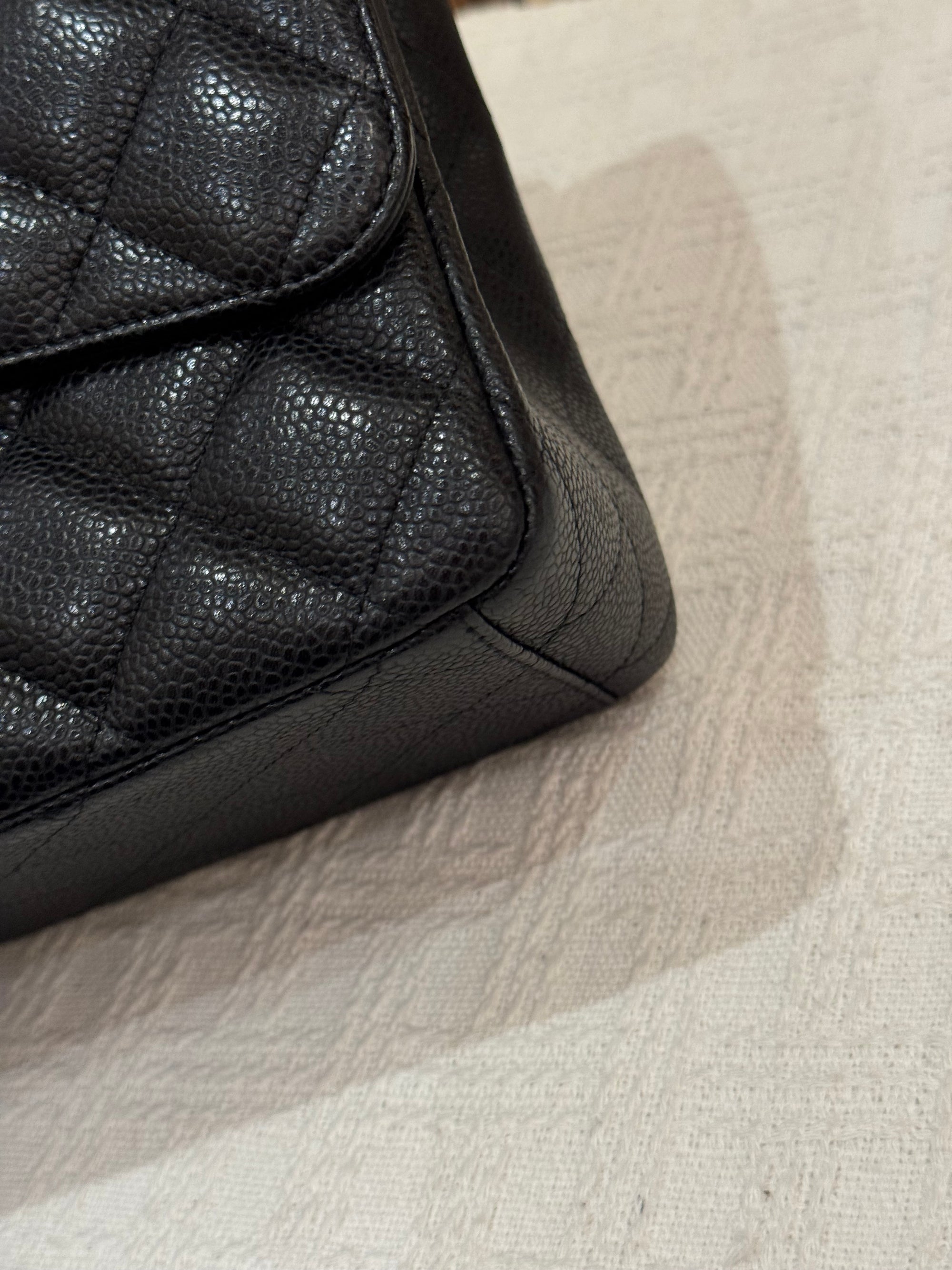 Chanel Maxi Classic Double Flap Black Caviar