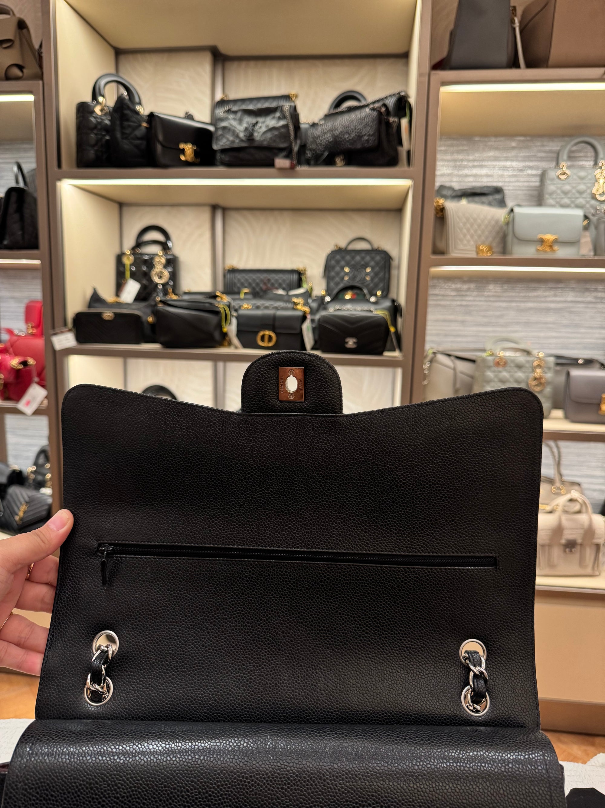 Chanel Maxi Classic Double Flap Black Caviar