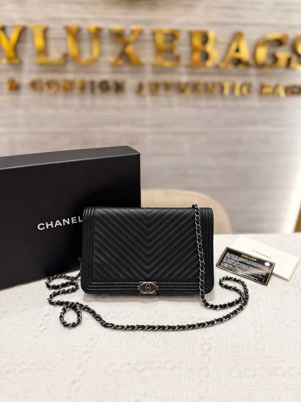 Chanel WOC Chevron Black Caviar RHW