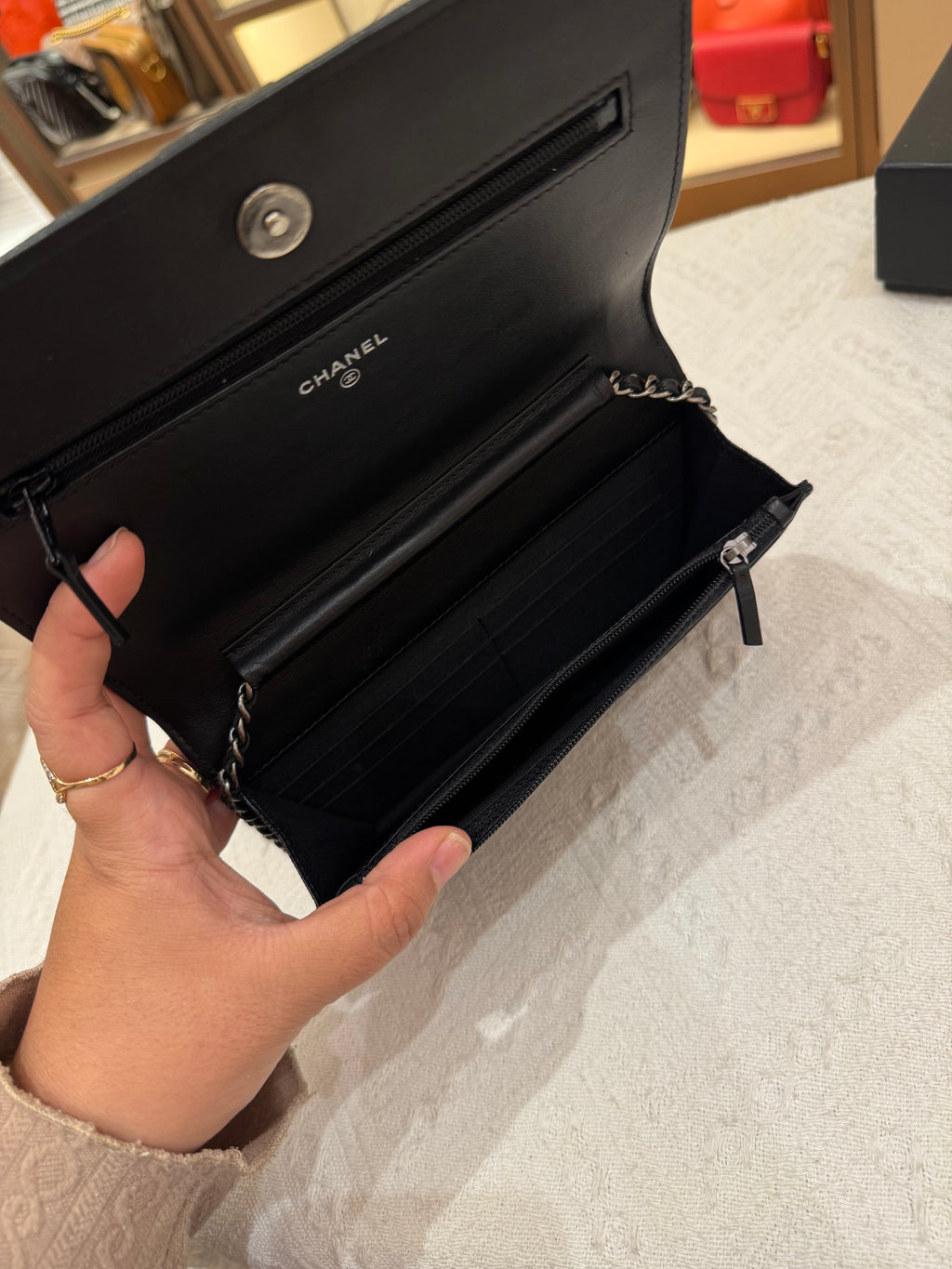 Chanel WOC Chevron Black Caviar RHW