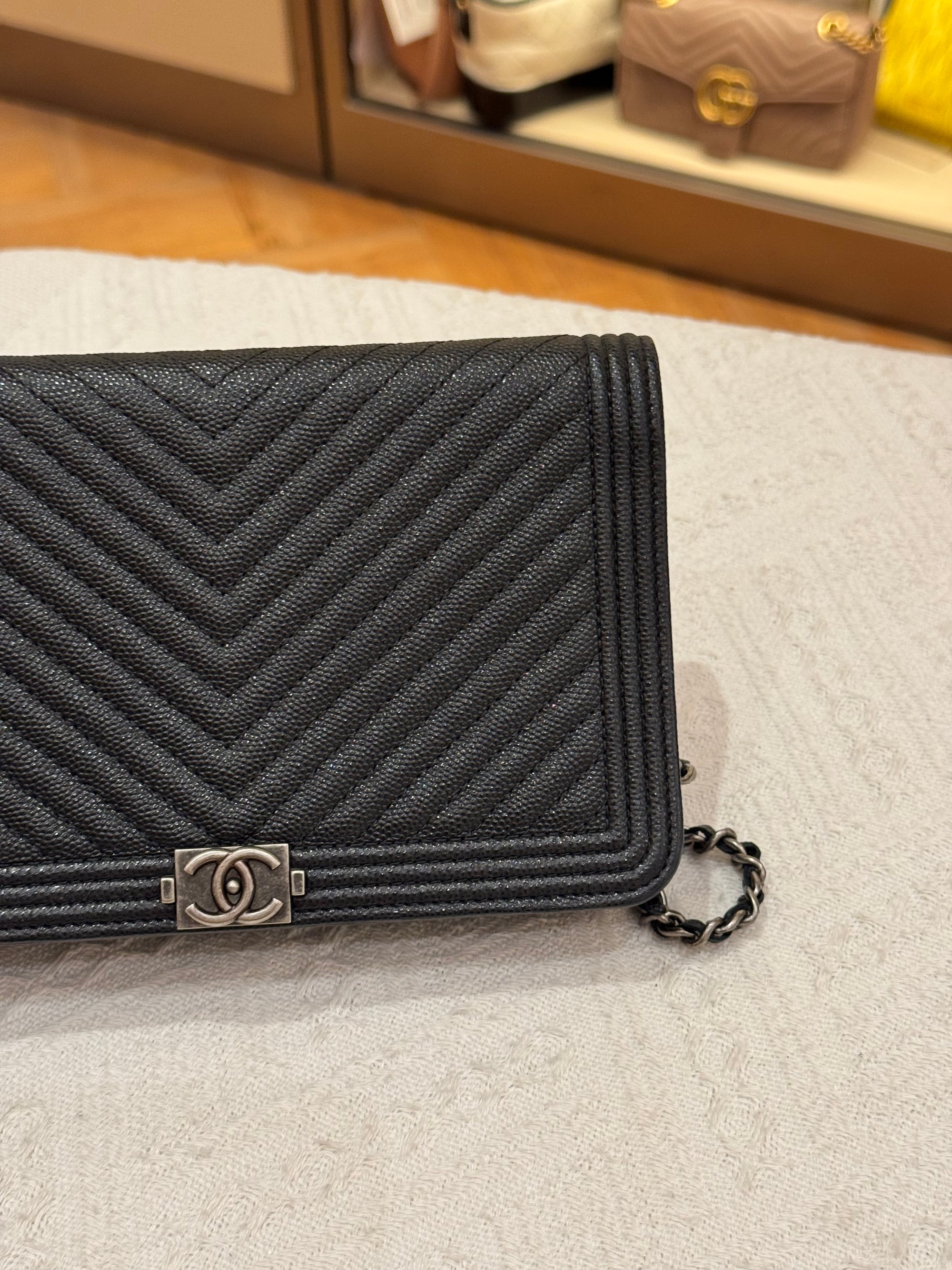 Chanel WOC Chevron Black Caviar RHW