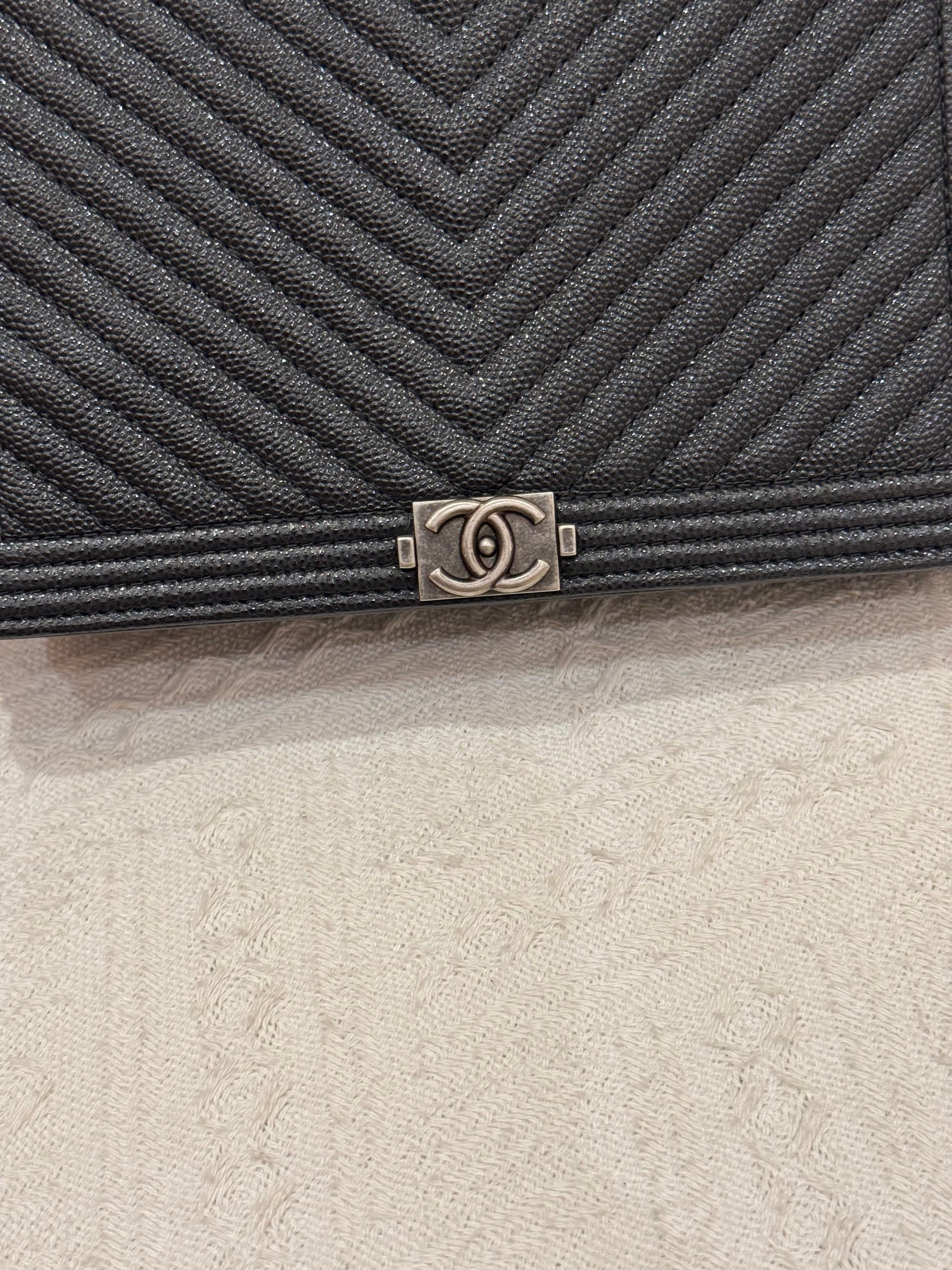 Chanel WOC Chevron Black Caviar RHW