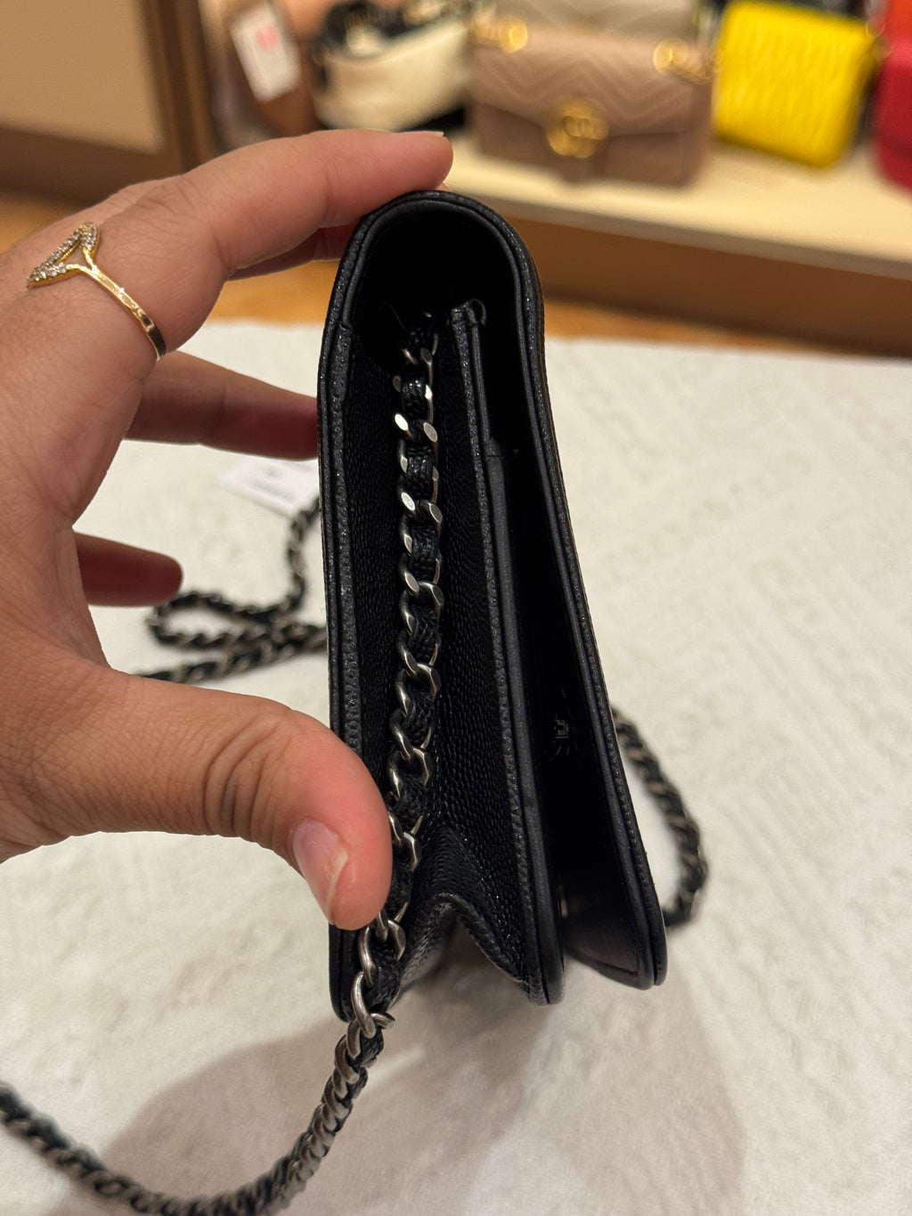 Chanel WOC Chevron Black Caviar RHW