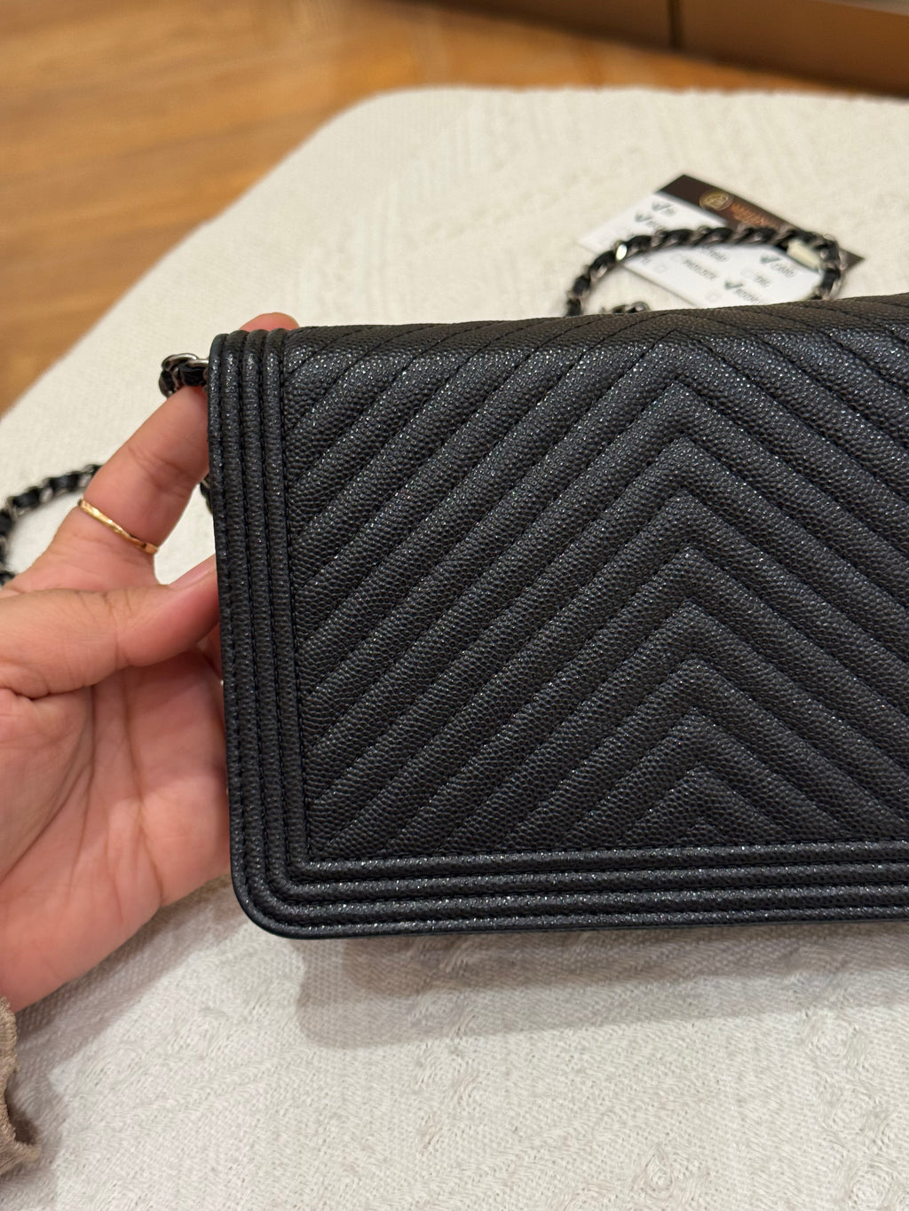 Chanel WOC Chevron Black Caviar RHW
