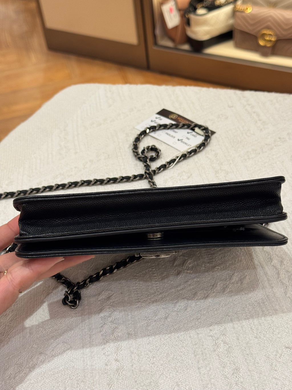 Chanel WOC Chevron Black Caviar RHW