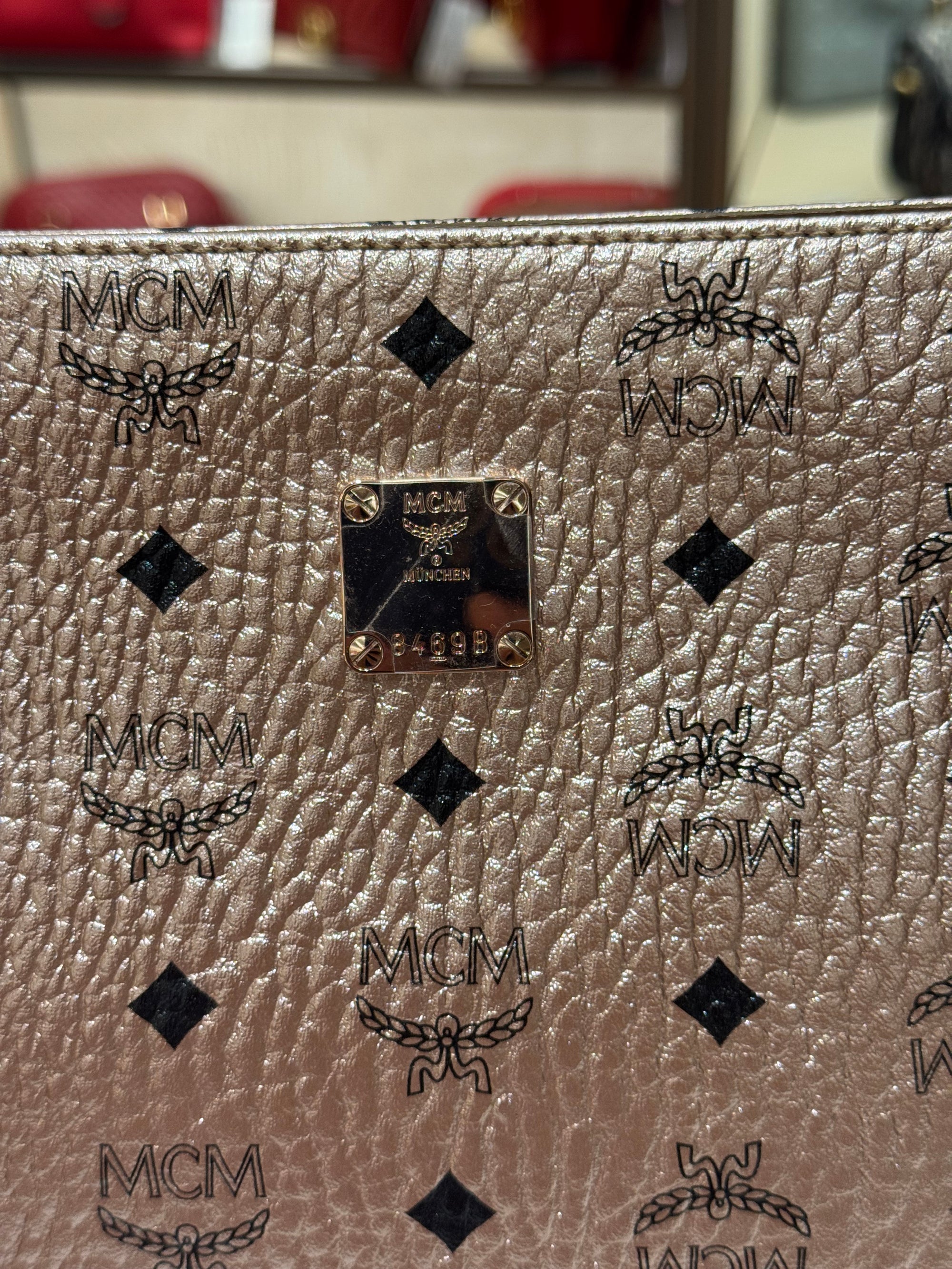 MCM Clutch Rose Gold
