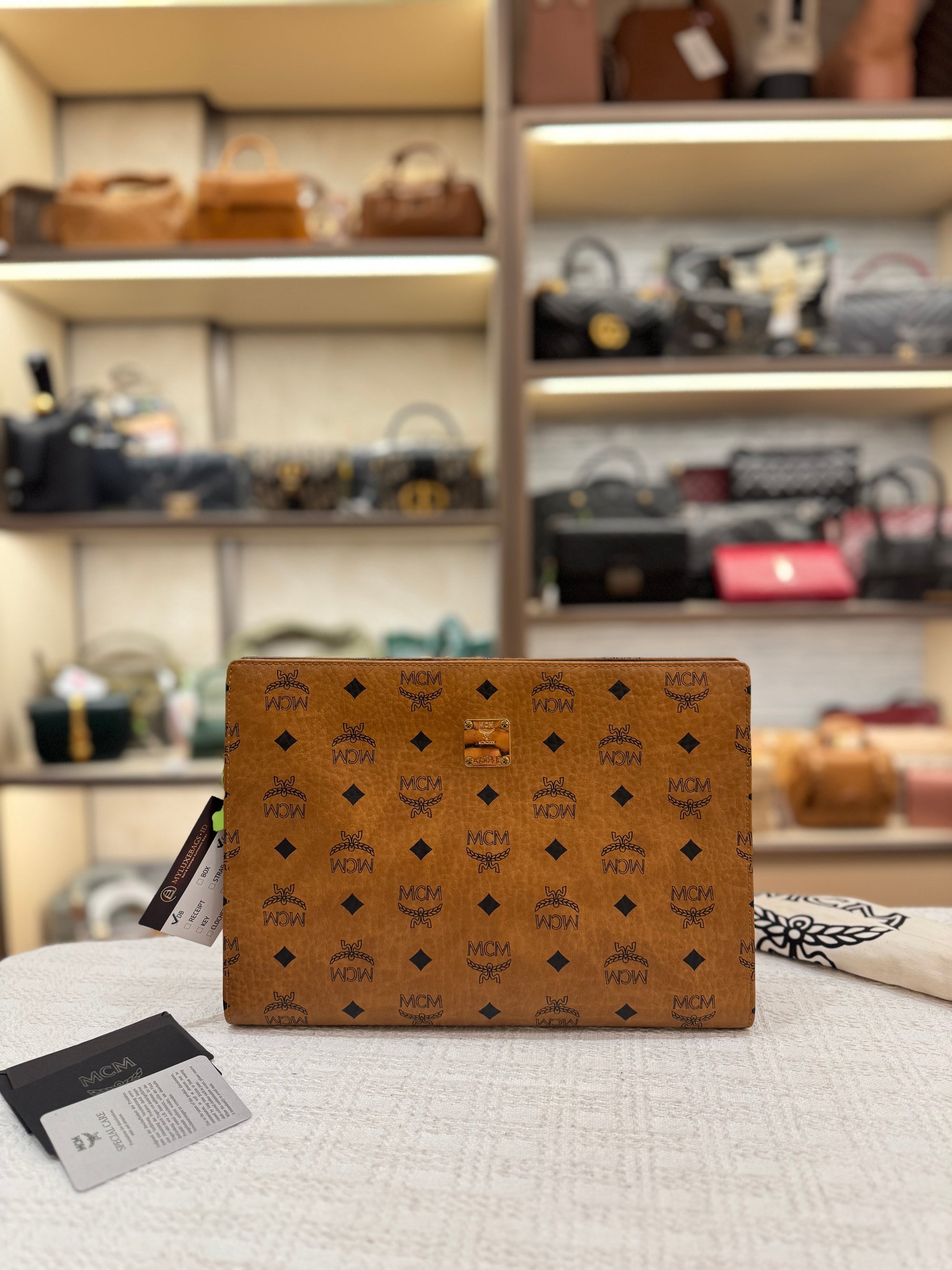 MCM Clutch Cognac