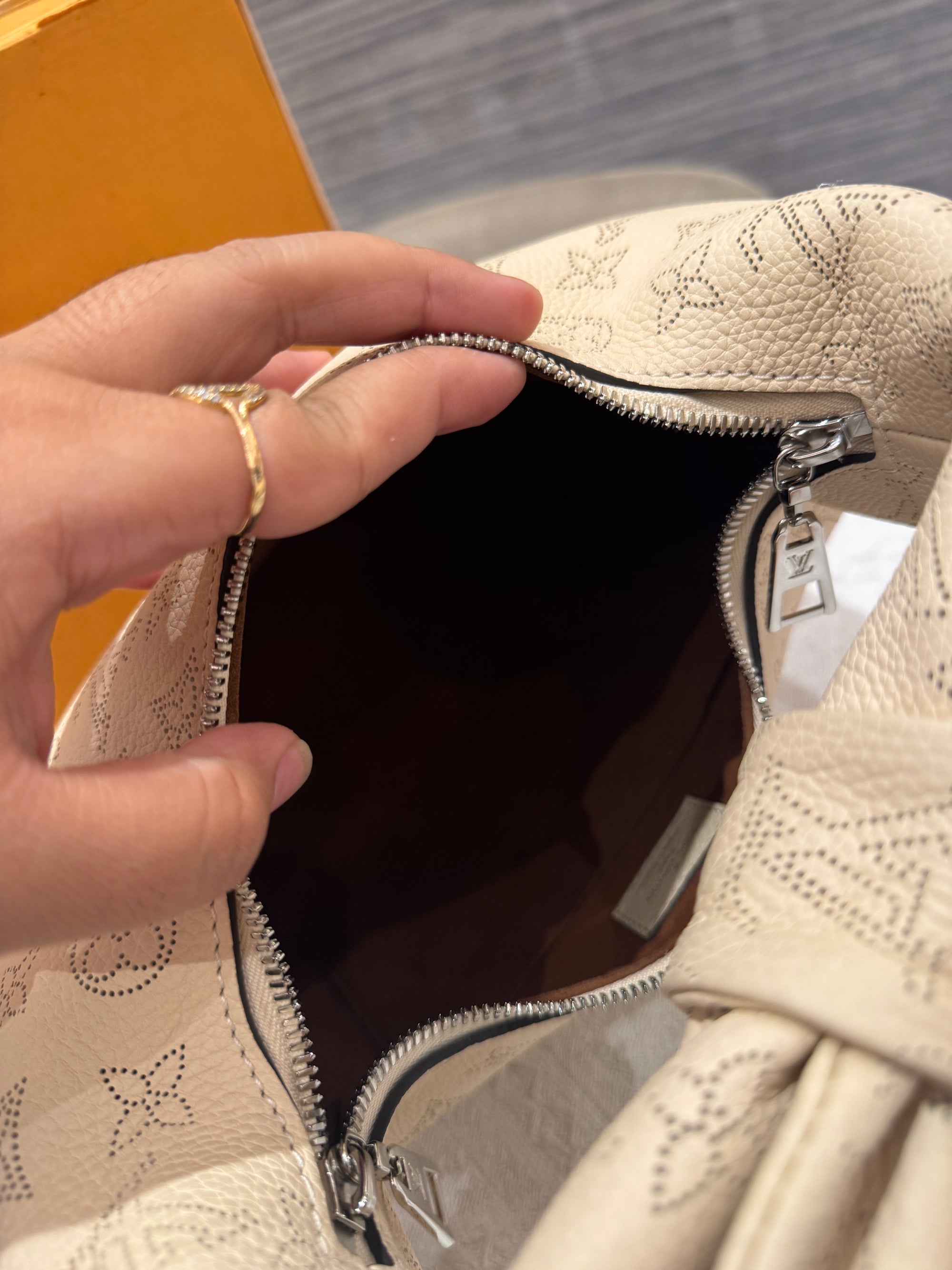 Louis Vuitton Why Knot Mahina