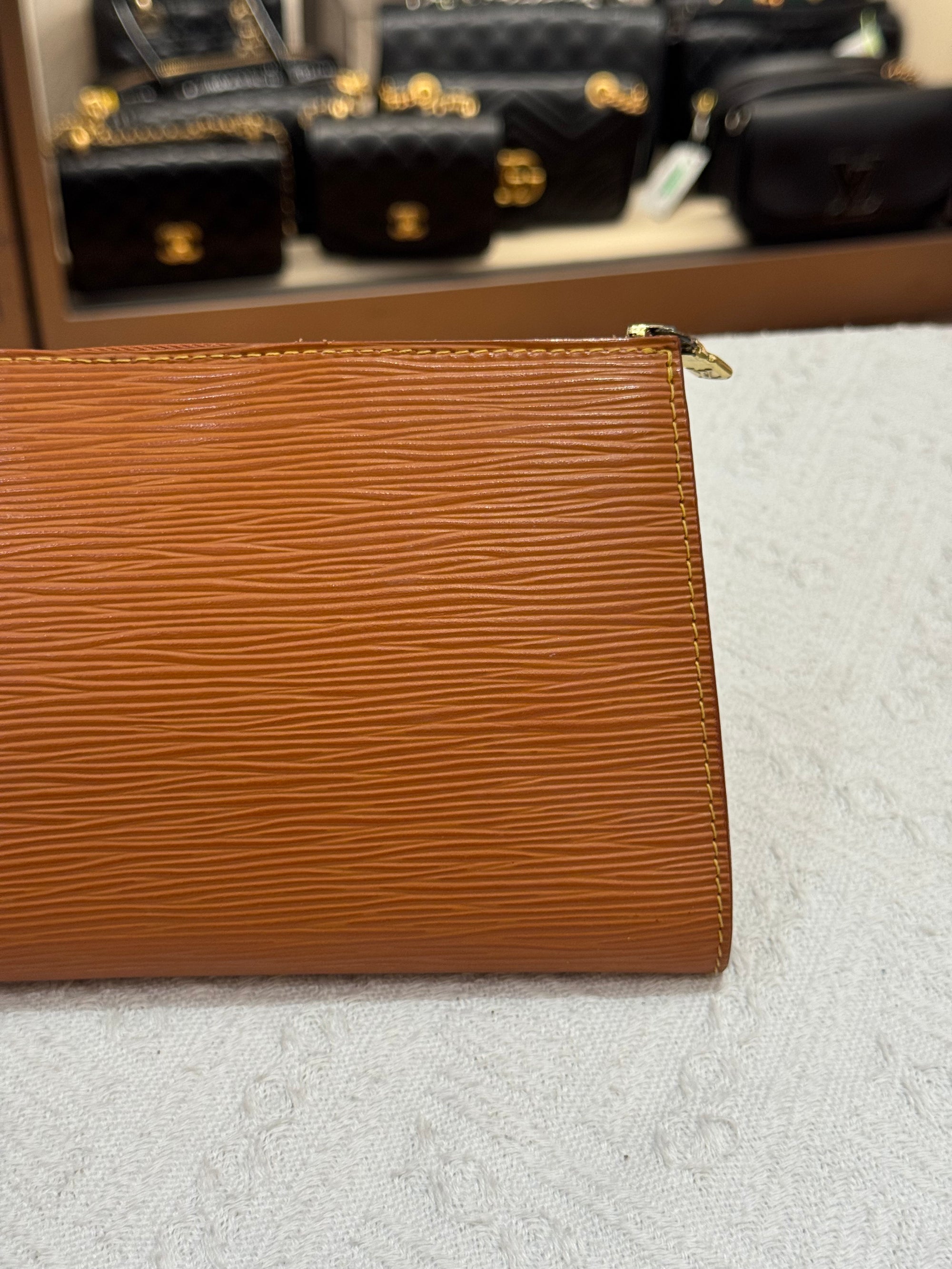 Louis Vuitton Pouchette Epi Leather Gold