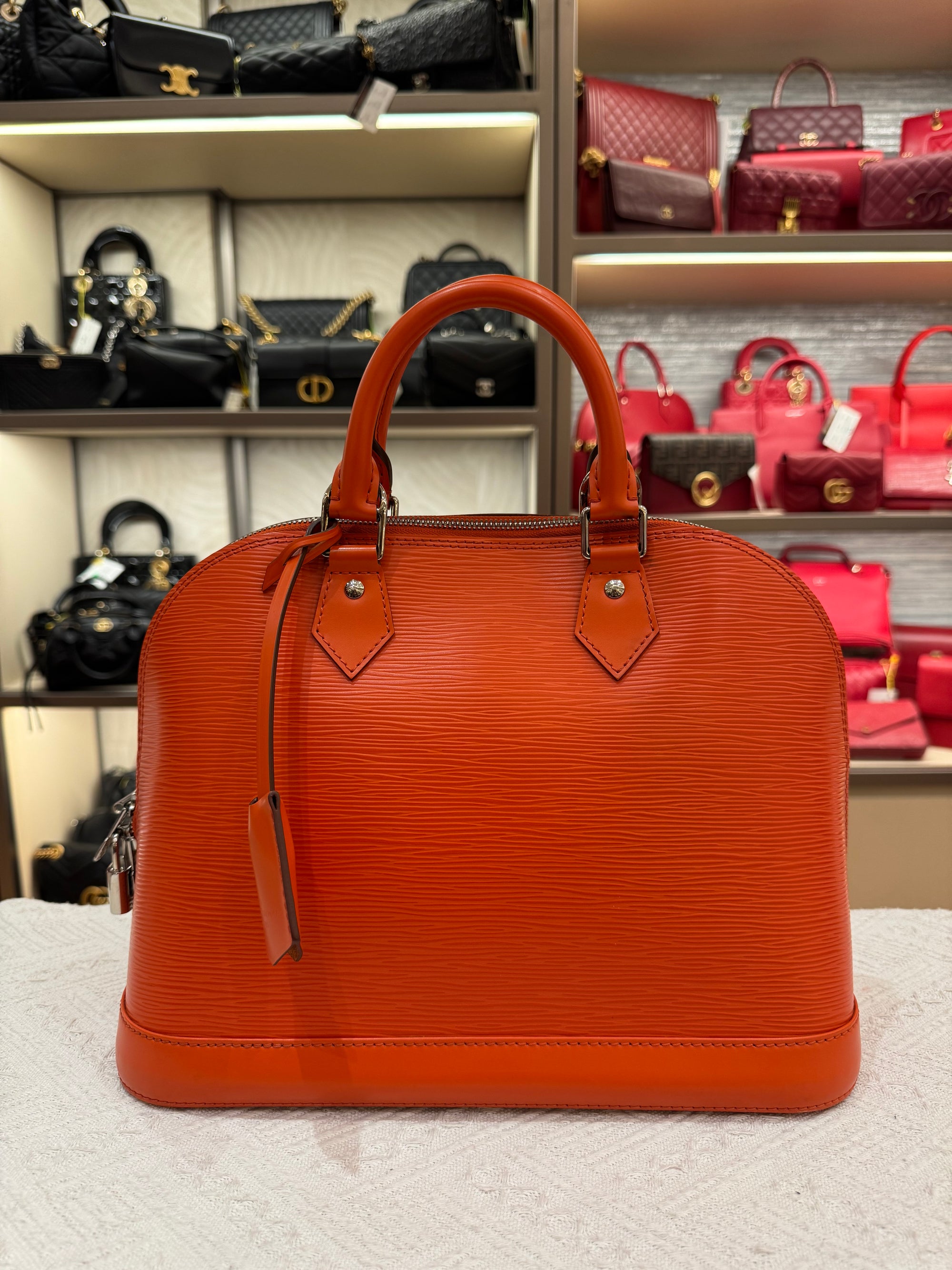 Louis Vuitton Alma Epi PM Piment
