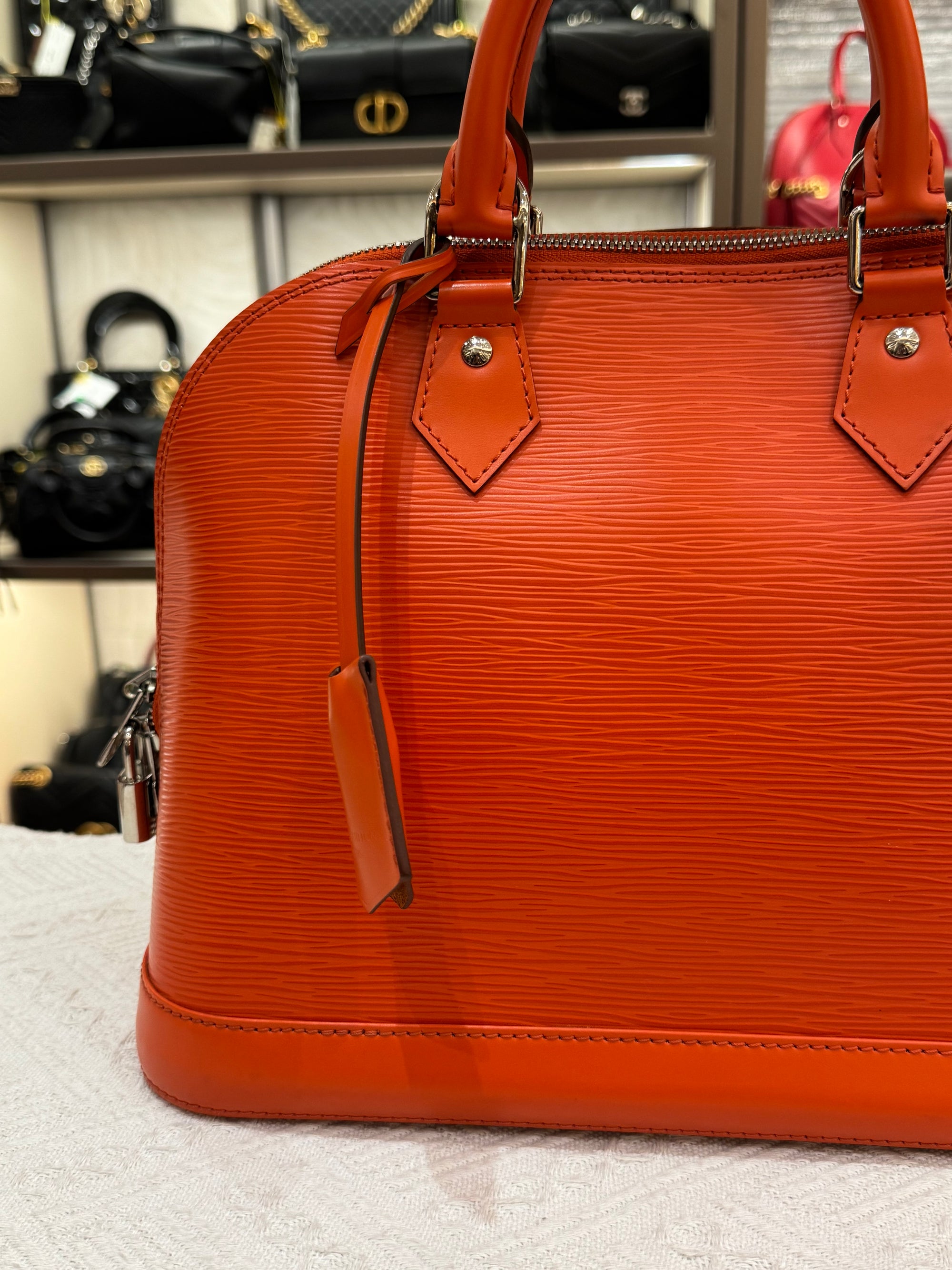 Louis Vuitton Alma Epi PM Piment