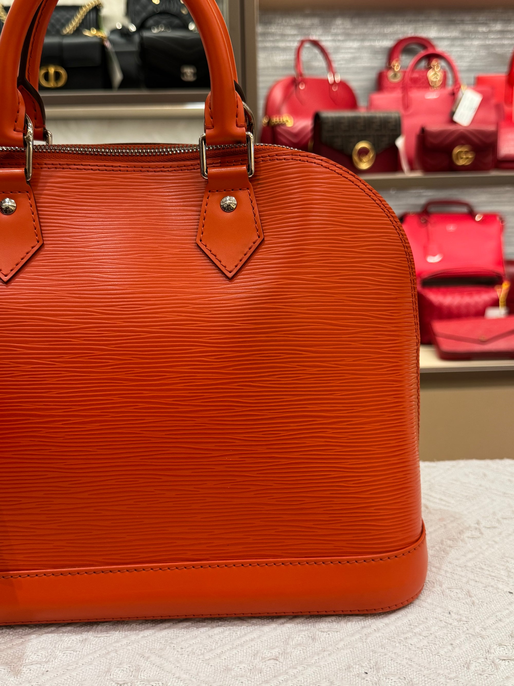 Louis Vuitton Alma Epi PM Piment