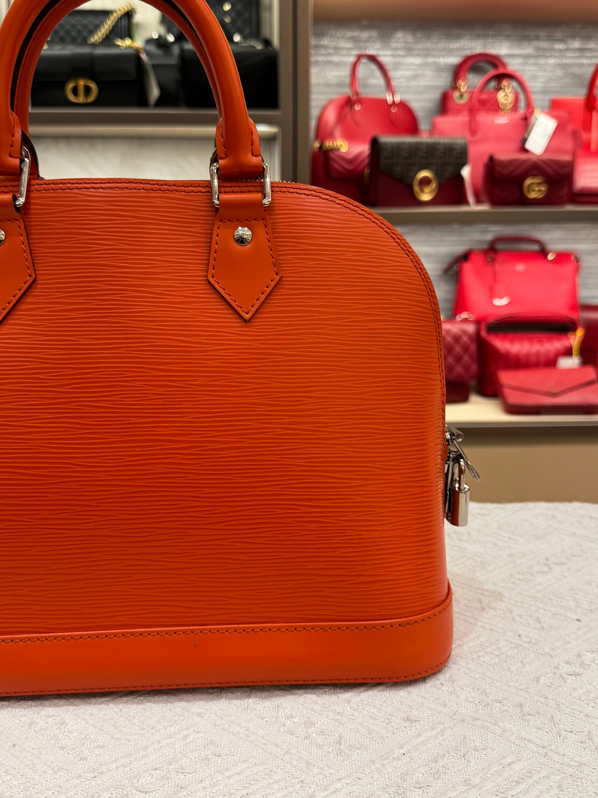 Louis Vuitton Alma Epi PM Piment