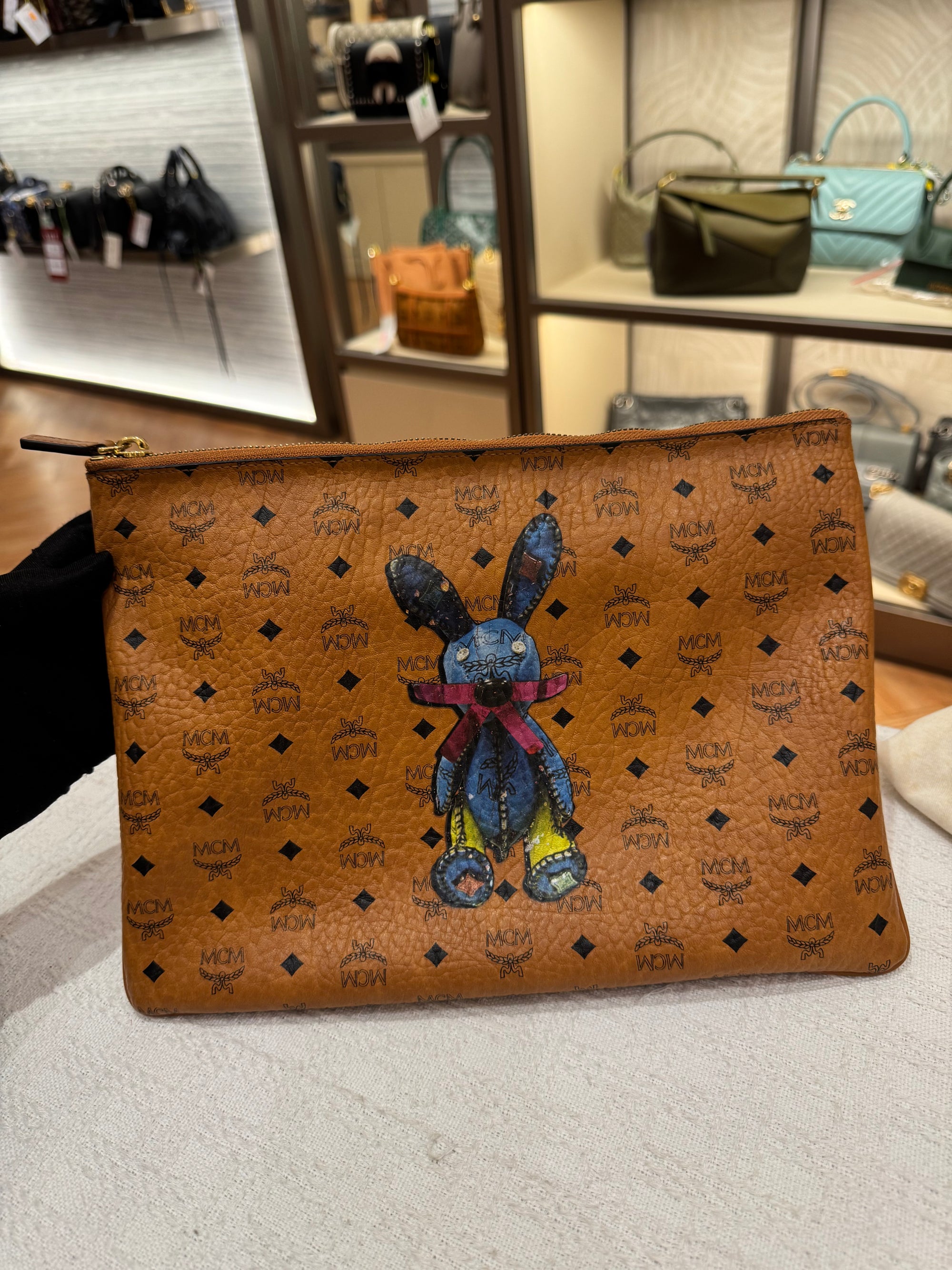 MCM Clutch Sling Cognac