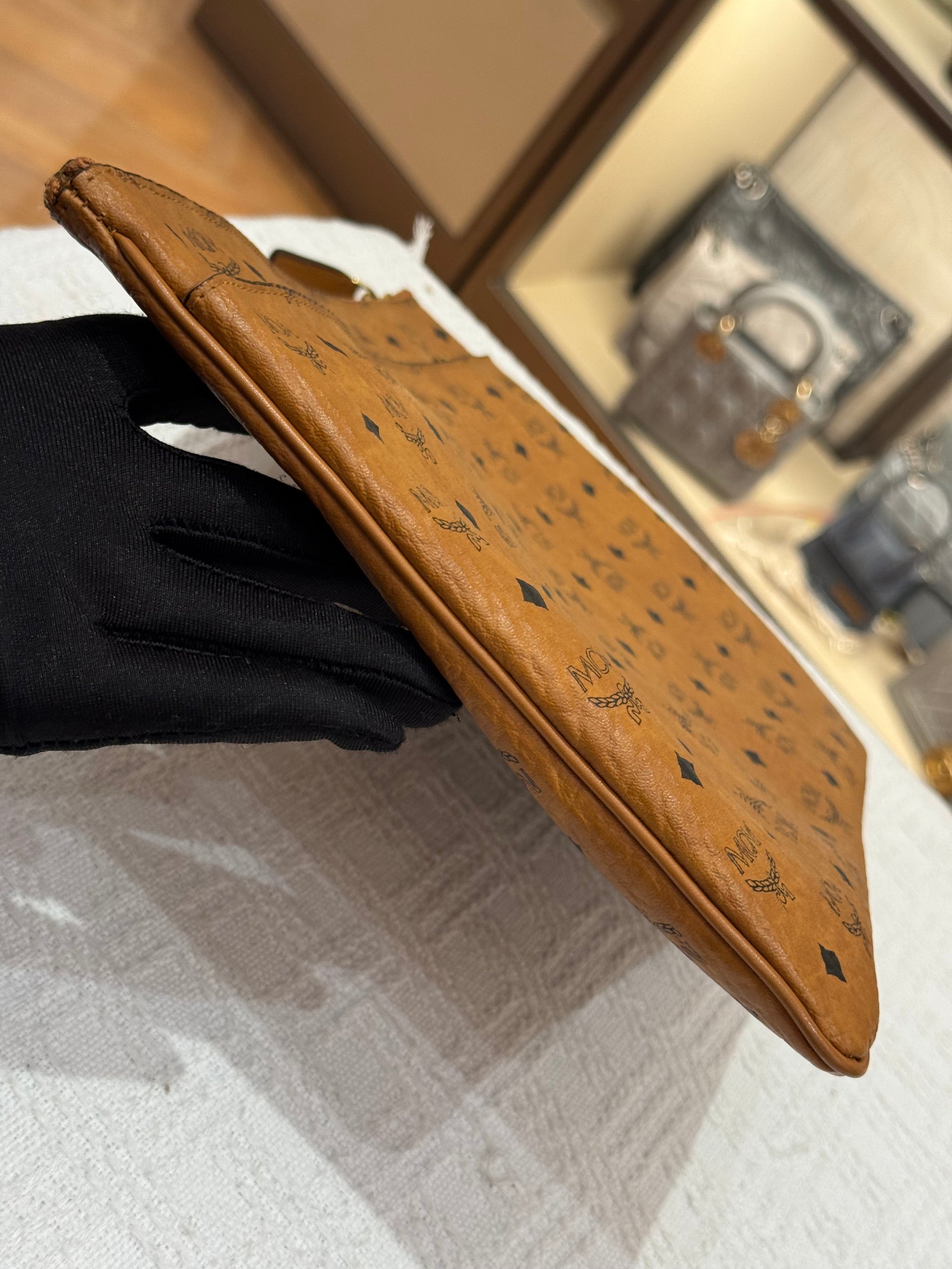 MCM Clutch Sling Cognac
