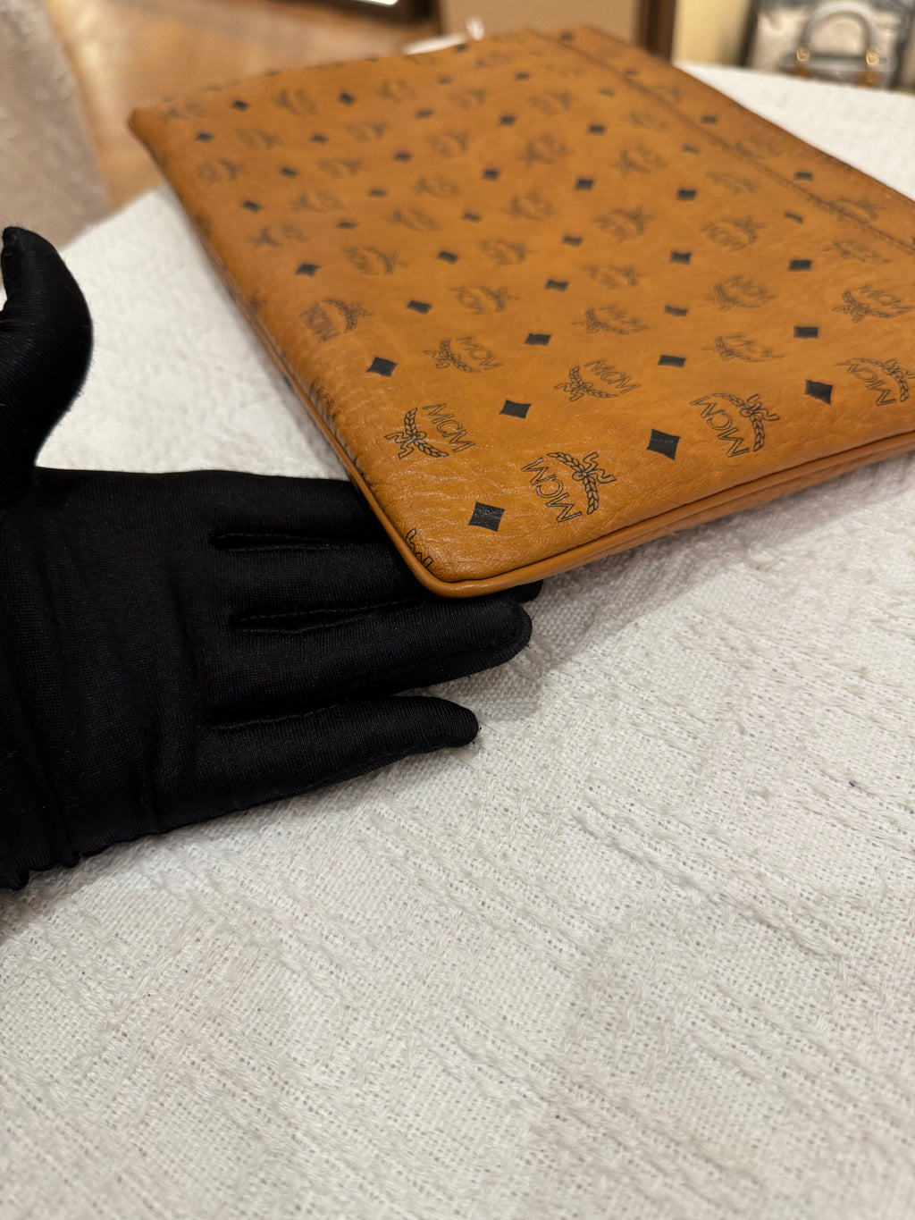 MCM Clutch Sling Cognac