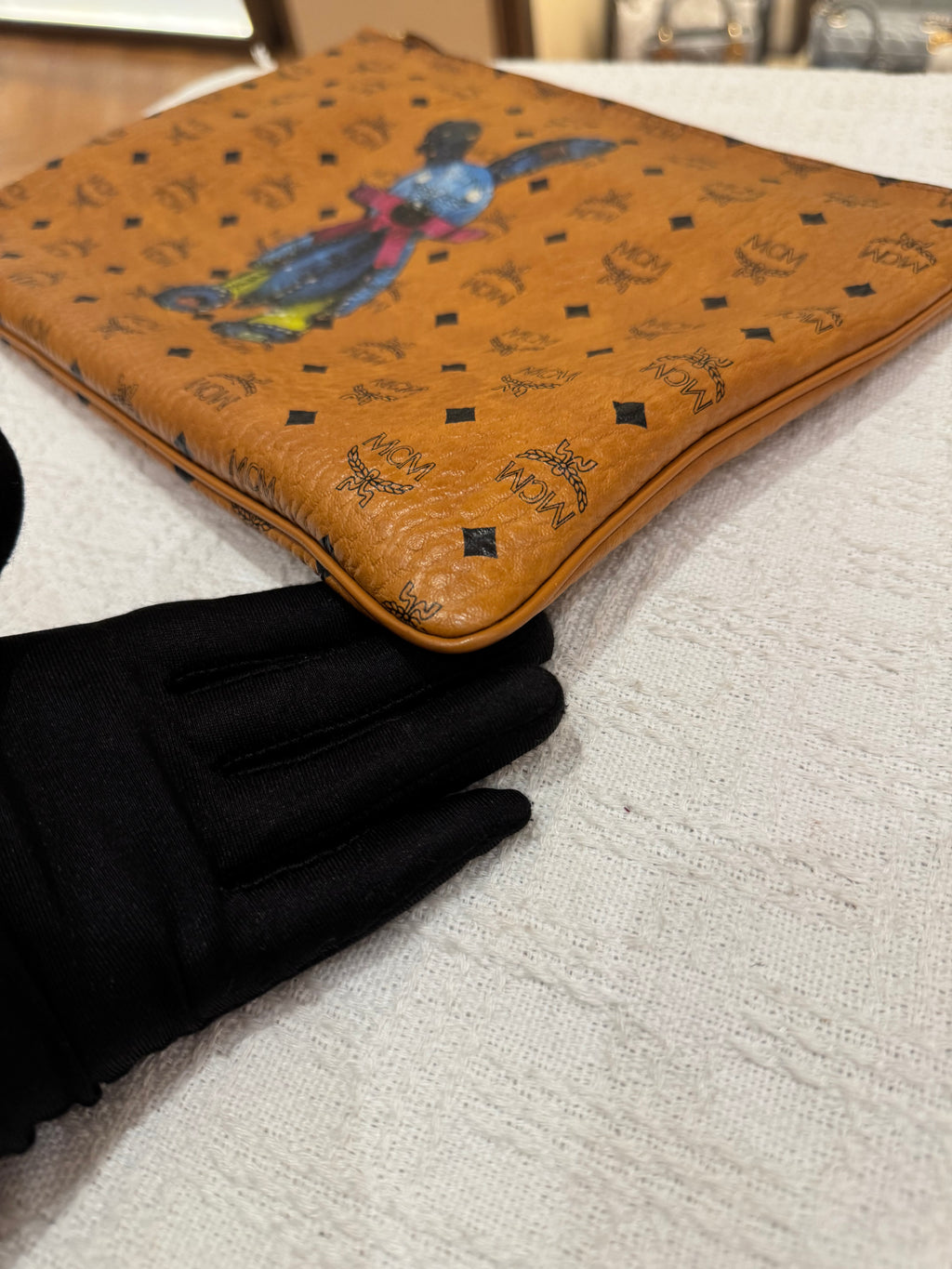 MCM Clutch Sling Cognac