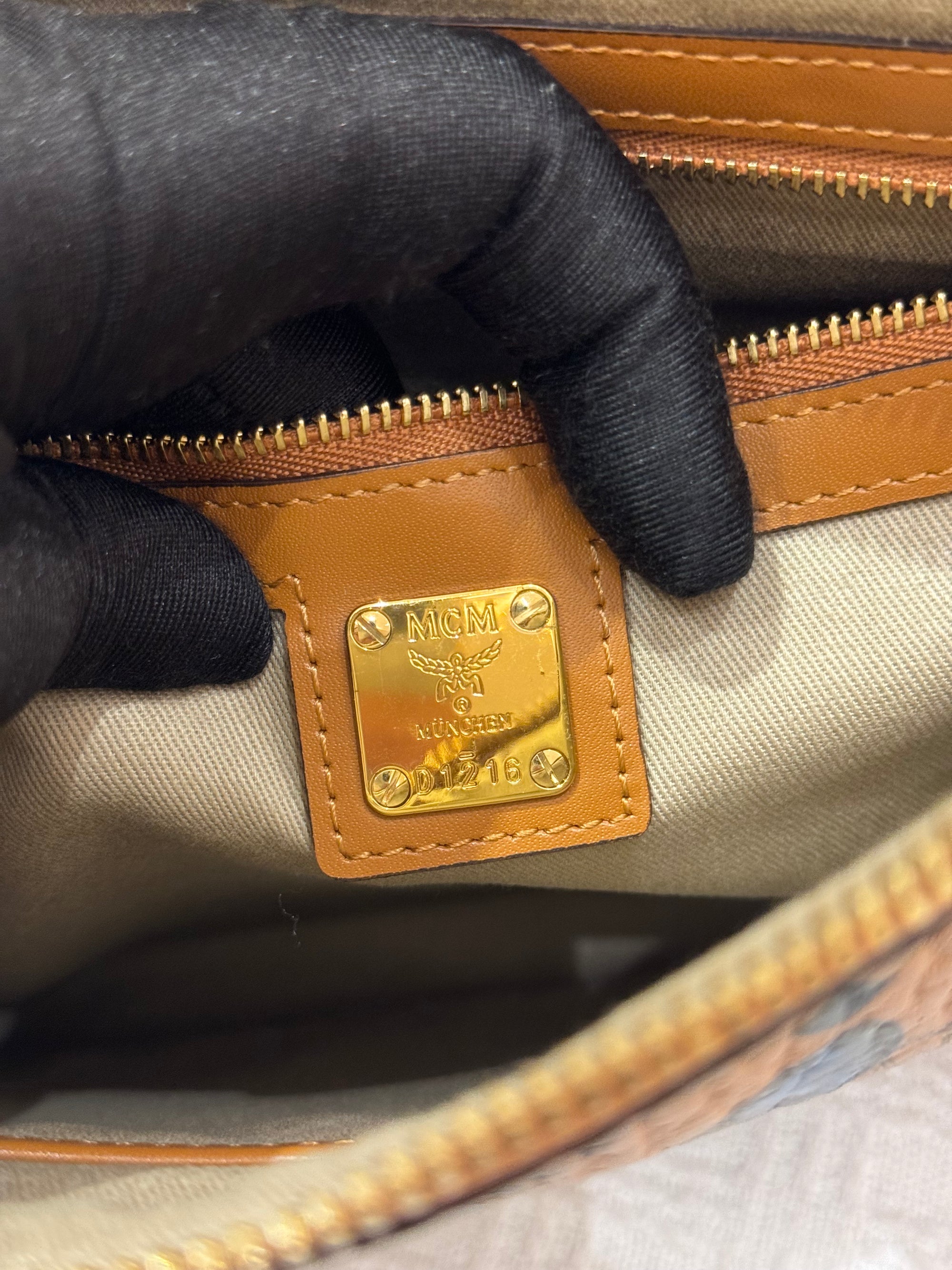 MCM Clutch Sling Cognac