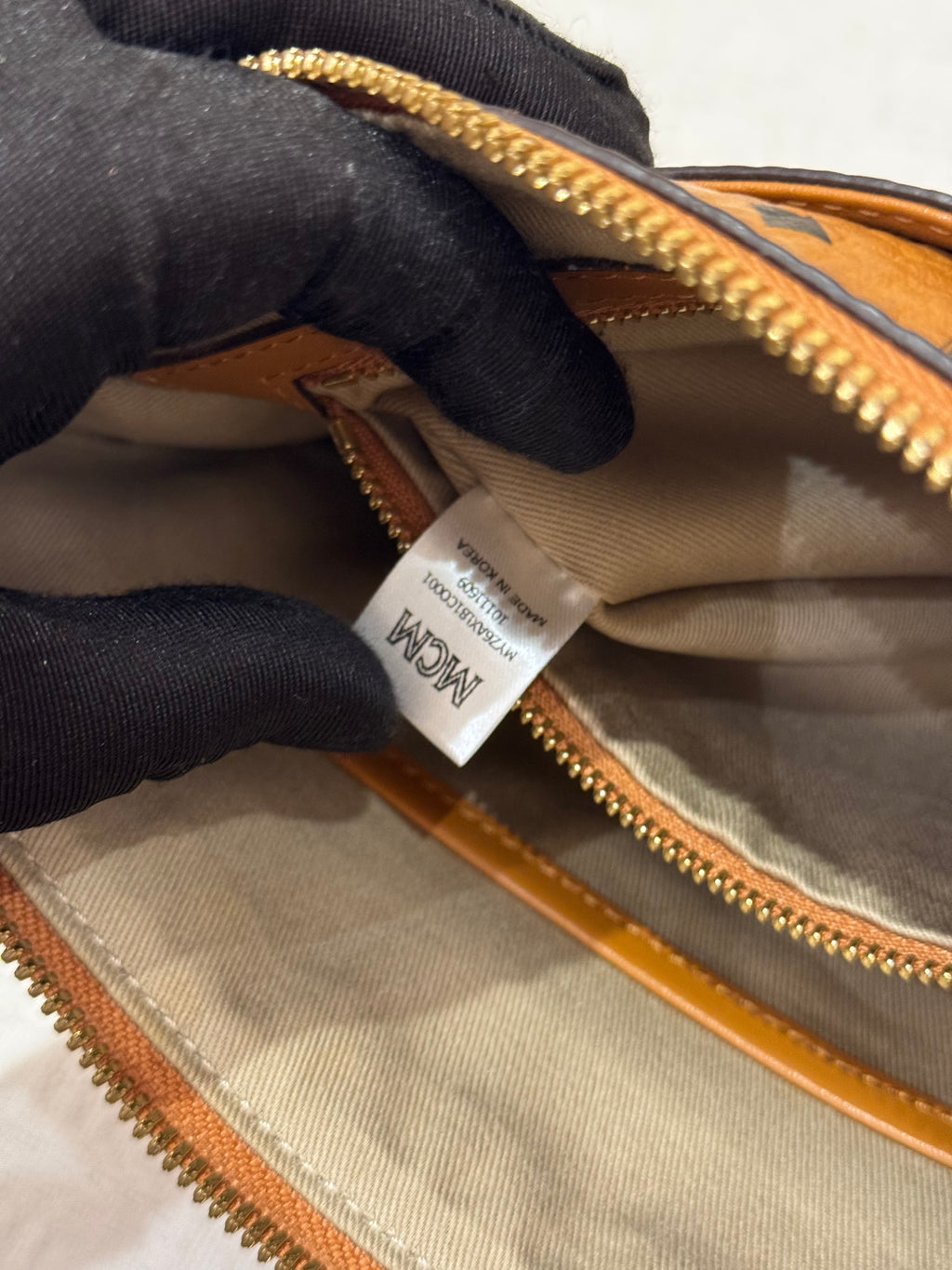 MCM Clutch Sling Cognac