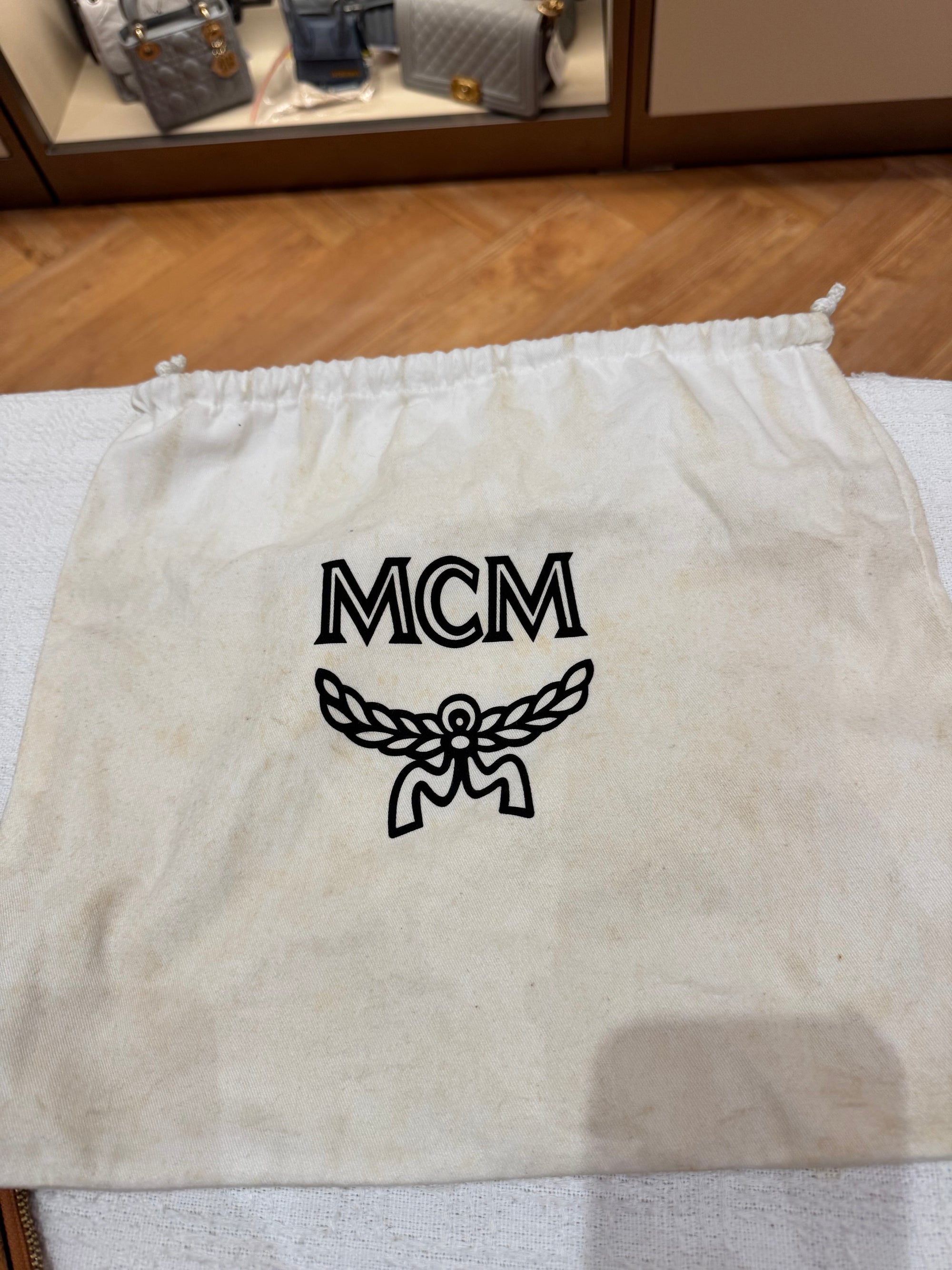 MCM Clutch Sling Cognac