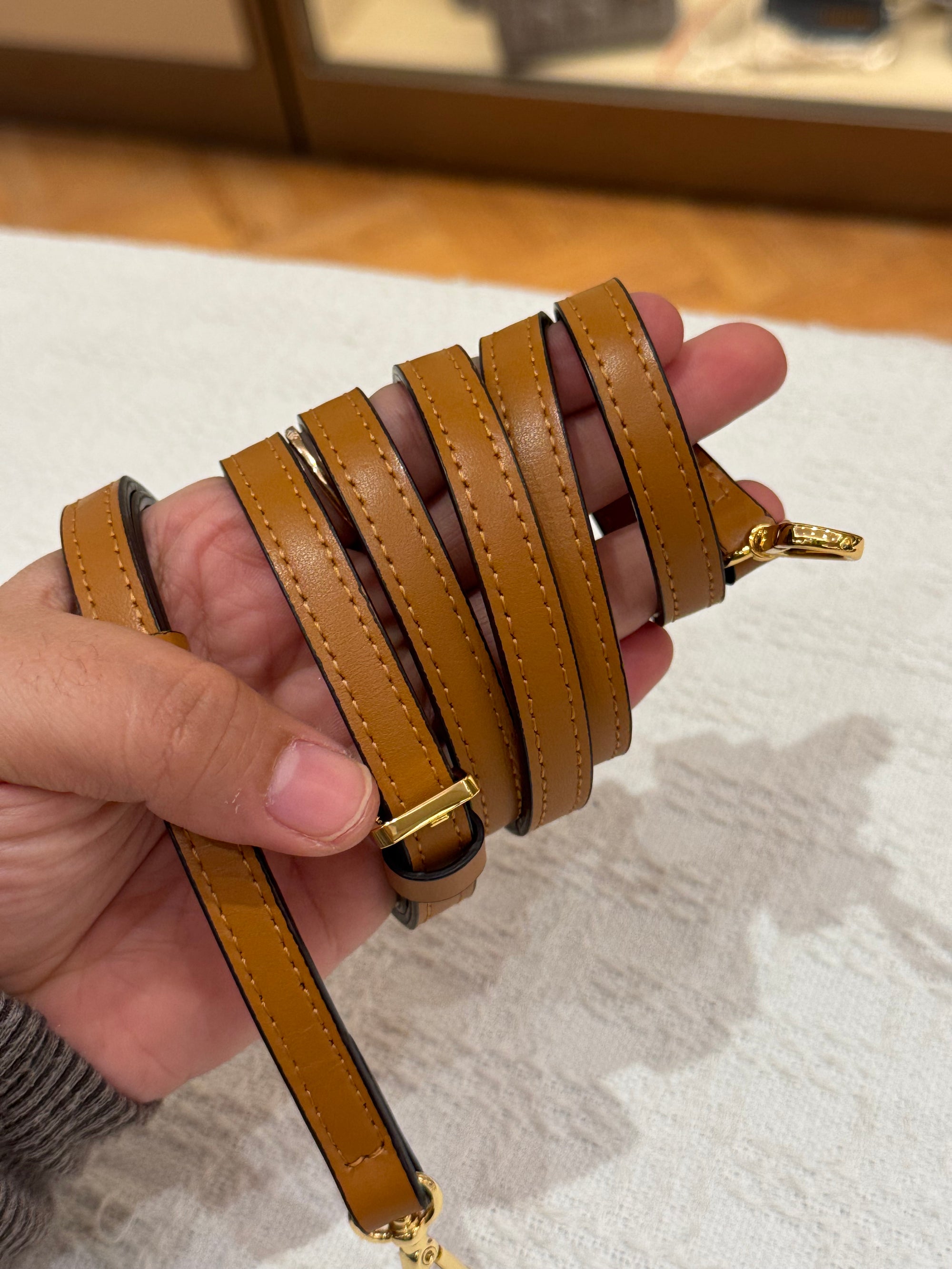 MCM Clutch Sling Cognac