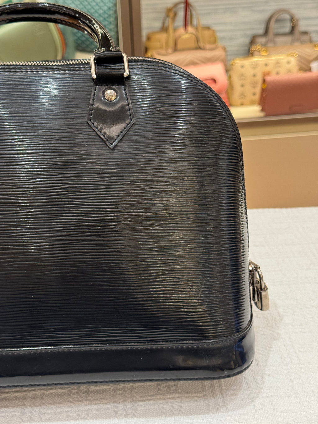 Louis Vuitton Alma PM Epi black Patent