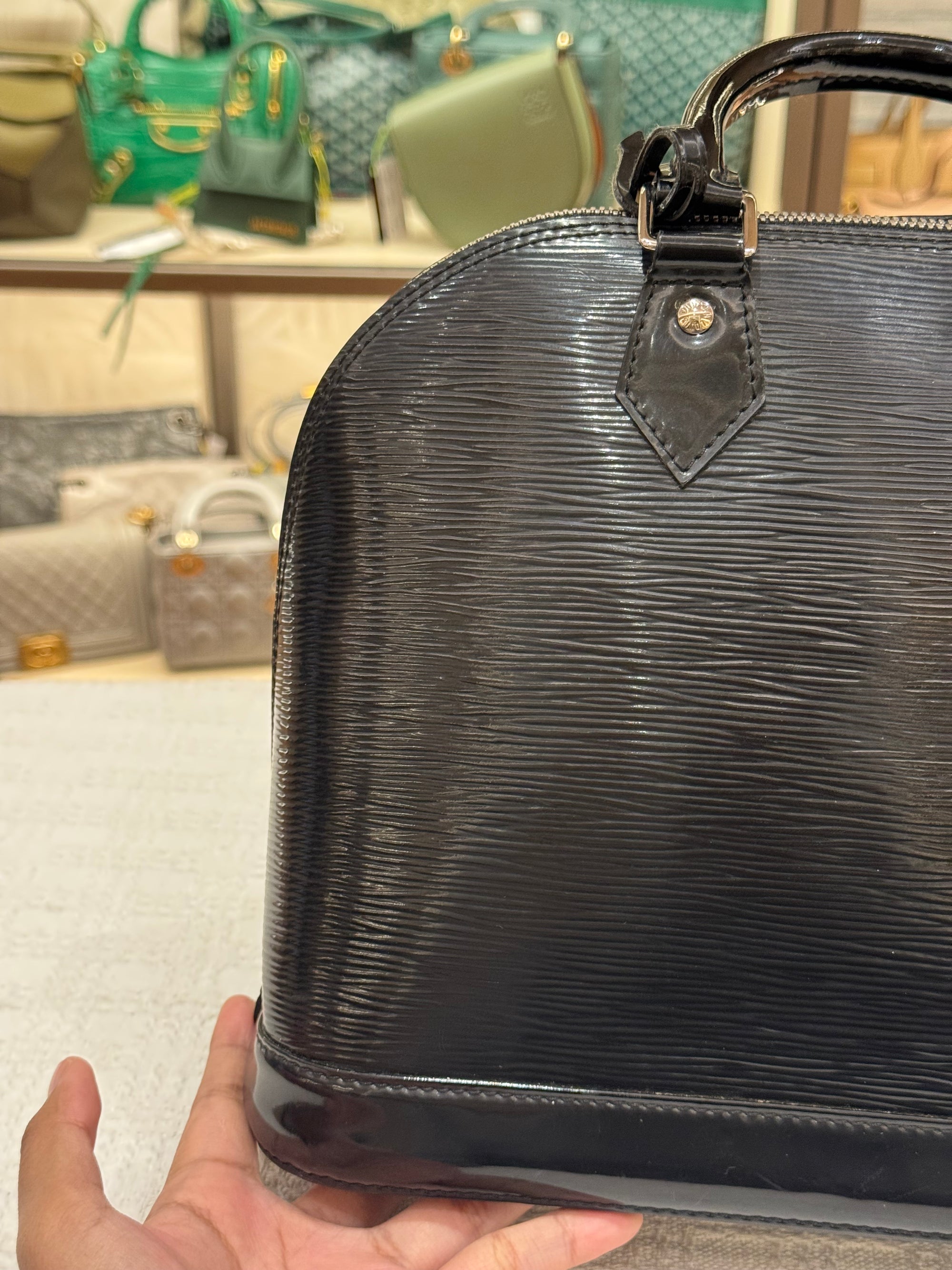 Louis Vuitton Alma PM Epi black Patent