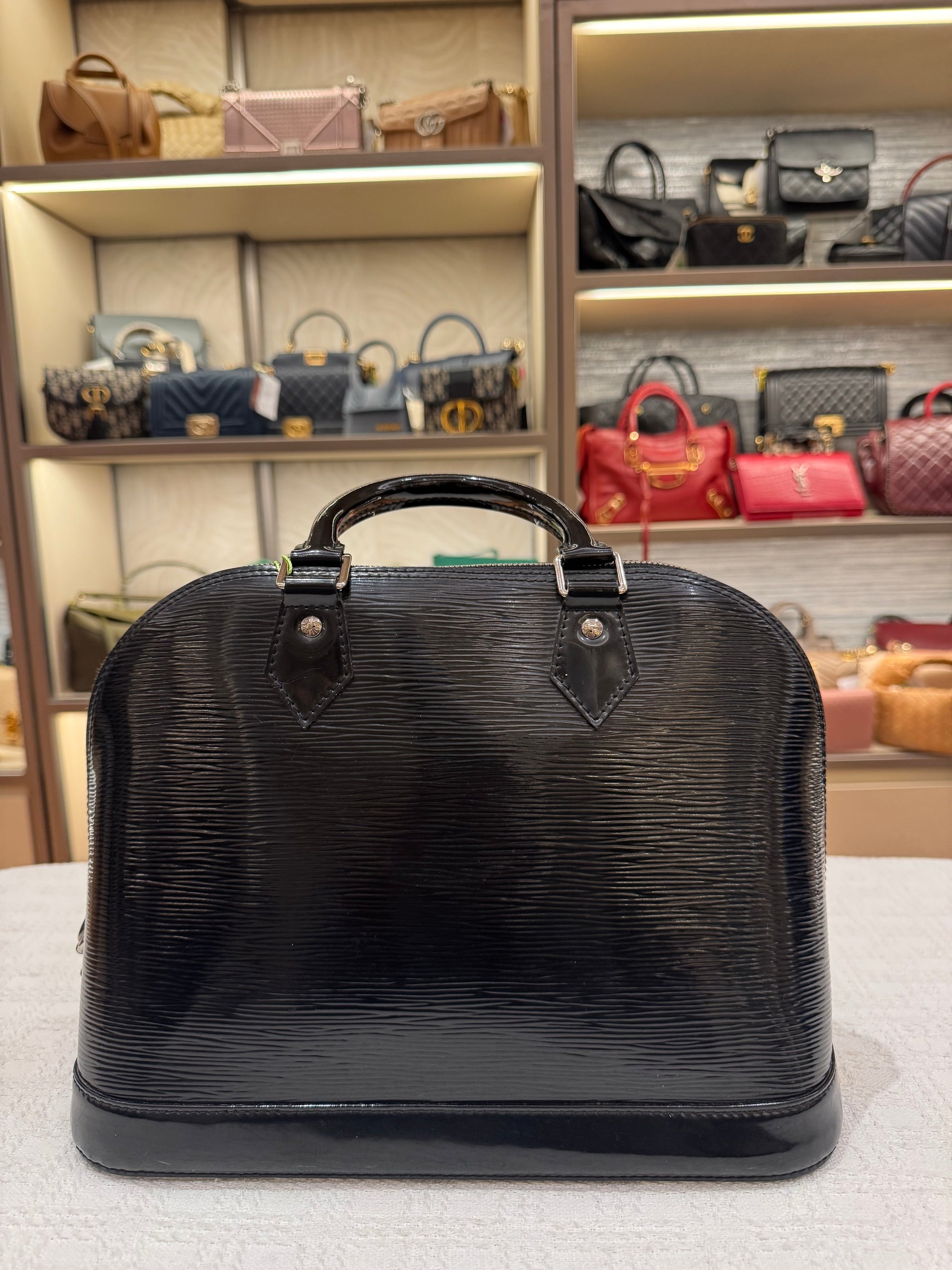 Louis Vuitton Alma PM Epi black Patent